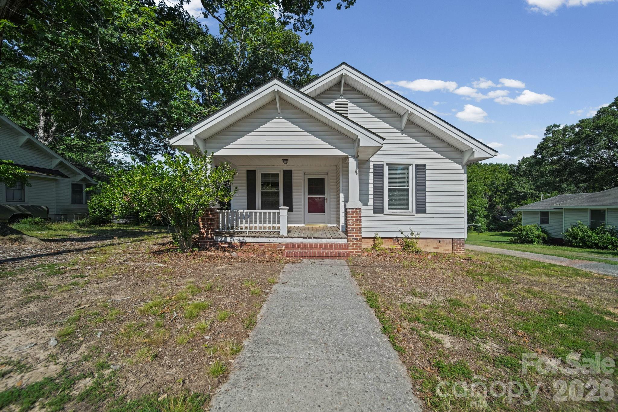 Welcome home to this charming property that's full of potential! Whether you're a first-time homebuyer, looking to downsize, or searching for a smart investment opportunity, this home offers an excellent foundation to make your own. Conveniently located just minutes from Atrium Health Stanly, shopping, dining, and everyday conveniences, you'll love the accessibility this location provides.

For added peace of mind, the home has been professionally appraised prior to listing and is priced at the appraised value. With a few cosmetic updates and your personal touch, this property could truly shine. Outside, you'll appreciate the detached carports, providing covered parking and additional storage options.

Don't miss your chance to own a well-located home with great potential and room to build equity!