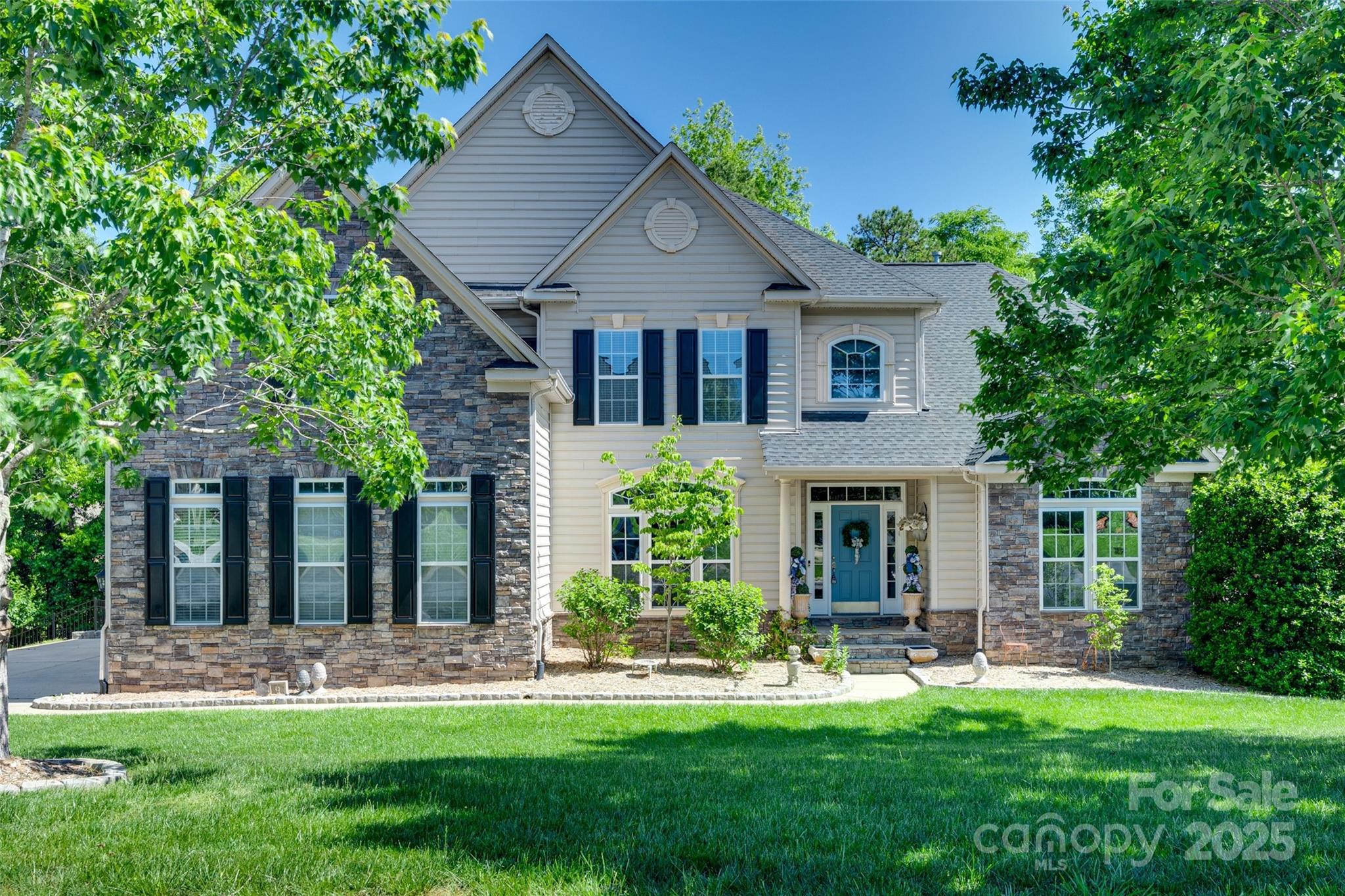 GORGEOUS desirable, flexible floor plan with high-end, custom upgrades & outstanding curb appeal! Welcoming grand entry opens to private study & dining room. Spacious 2-story living room with stacked stone gas fireplace, wood floors & cozy living room with coffered ceilings. Expansive kitchen with granite counters, endless cabinet storage, stainless steel appliances including double ovens & center island with bar seating, butler's pantry, & impressive morning room area doubling as another dining area. Owner’s suite on main level with expansive bath featuring large spa-like shower & dual vanities, plus awesome double closets! Auxiliary bedrooms each have their own bath & BONUS ROOM up. Designer fixtures and finishes, and fantastic natural light throughout! Back deck and patio looks over a raised backyard that is fully fenced – perfect for your morning coffee! Upgraded exterior light package included. Tall crawl space for additional storage & full irrigation system.
