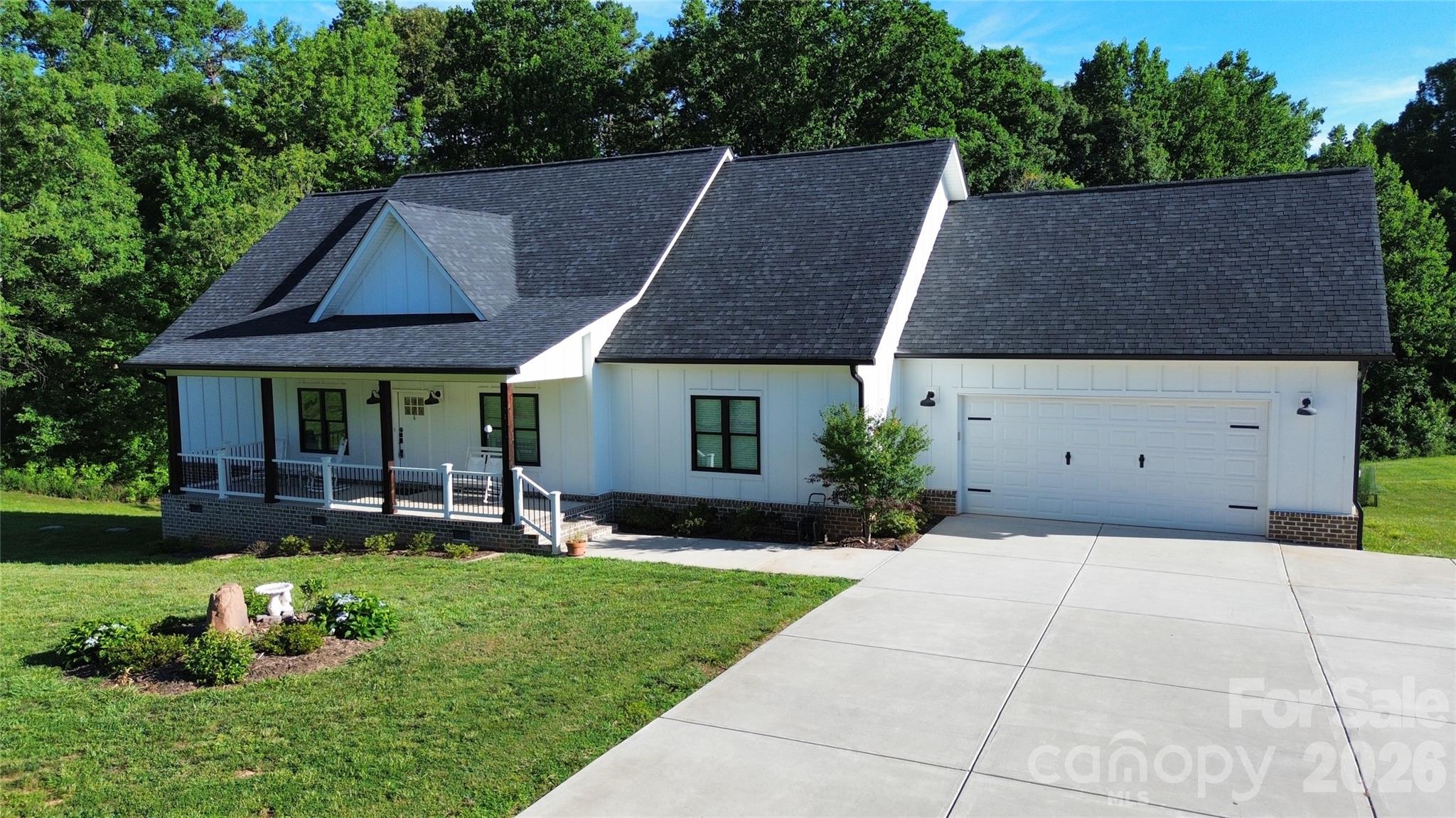 MOTIVATED SELLERS!!! If you’ve been looking for newer construction with room to spread out, this is it. Built in 2021 and sitting on 1.72 acres, this 4 bedroom, 2.5 bathroom home welcomes you with a deep front porch made for rocking chairs and relaxed evenings.  Inside, the layout is both spacious and practical. The kitchen includes pull-out cabinet shelves for easy access and the refrigerator will remain with the home. Just off the garage is a large drop zone area that’s currently a blank slate and ready for you to customize however you’d like. It would a perfect drop zone, work or study area.
The primary suite features a large bathroom with a giant walk-in shower, soaking tub, and double sinks. The primary suite also has a door leading to the deck. One of the secondary bedrooms includes a walk-in closet, and the laundry room is generously sized with a large lockable storage closet.
Additional features include keypad entry at the garage, a 3-stage water filtration system for the well, and a large gun safe that will remain with the home.
Outside, the 1.72 acre property gives you plenty of space to spread out, with blueberry bushes and apple trees already planted. Located in a great school district with North Lincoln Schools.