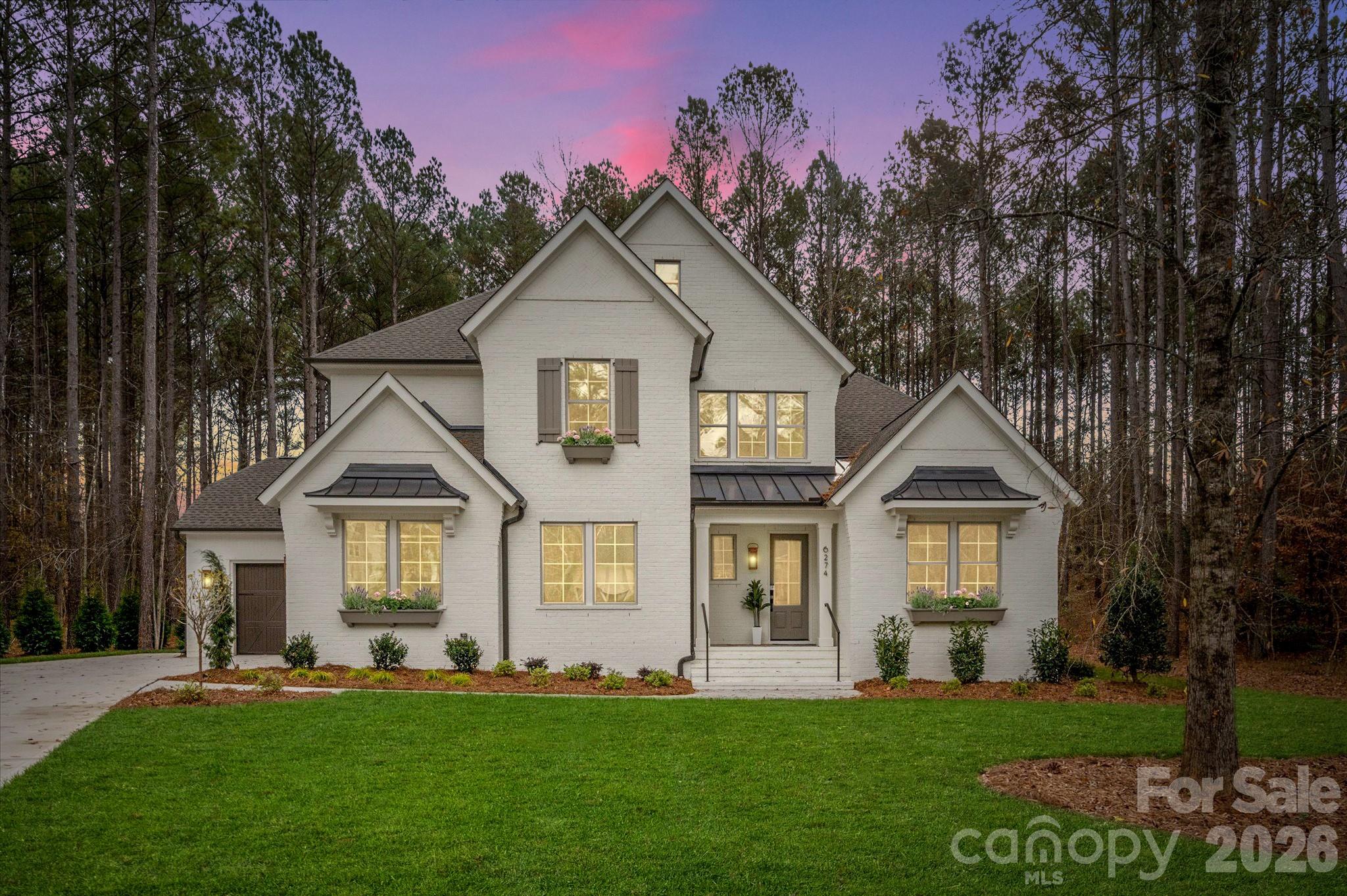 Looking for a brand new luxury home on a private wooded lot?  This home is a must see! Come experience Riverchase Estates where World Class amenities meet serenity and privacy! See attachment detailing all the Luxury finishes throughout! Full brick home with Owner's and guest on the main. The Monterey features a beautiful 2 story foyer, oversized Kitchen with Scullery or Butler's Pantry, and large walk-in Pantry. Gather around the large island and enjoy the view to Outdoor Living and vaulted Great Room with huge windows. Stacking glass doors lead to the Outdoor Living Area with skylights. Dining Room has a second set of sliding glass doors. Owner's retreat is vaulted with free standing tub, & large shower.  Guest suite can double as home office. 3 more bedrooms upstairs, each with their own full bath! Large Bonus, great space for the whole family to play, and walk-in storage. Don't miss this opportunity for move in ready luxury!  Start your tour at the model home 7 days a week. Too busy to visit during model hours? Tour this home between 7am and 7pm using NterNow. Contact us for additional information. New Your Choice Incentive of $40,000 to buy down your rate or take off the price of the home!