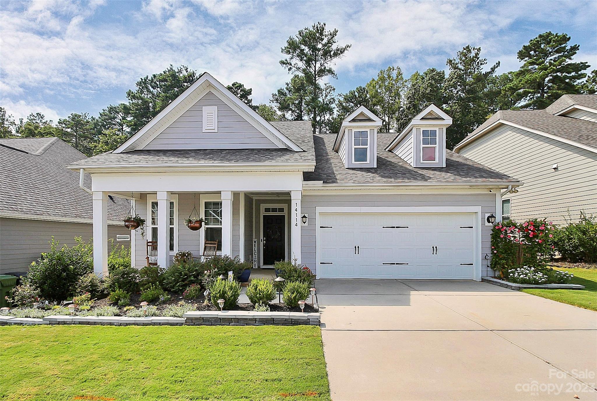 Beautiful 1.5 story home in an exceptional condition! Open floor plan for easy entertainment with guests. Hardwood floors throughout common areas on main level and tile in all three full bathrooms. Primary bedroom on main level. Jack and Jill vanities and stand up shower in primary bathroom. Walk in closet accessible through two point of entries. Sitting/ reading room, second bedroom, and a full bathroom on the main level. Dedicated office/ flex space or a formal dinning adjacent to kitchen. Oversized recreational room on second floor. Third bedroom with a full bathroom located on the second floor. Dual zone HVAC system with smart thermostats and built-in ventilation fan and humidifier. Current owners have invested $65,000+ in outdoor upgrades that include: screened porch, extended patio, retaining wall, trenched water run off, Bermuda sod, front flower bed, solar lights. Community amenities: club house, outdoor pool, tennis courts, golf course, miles of sidewalks and walking trails.