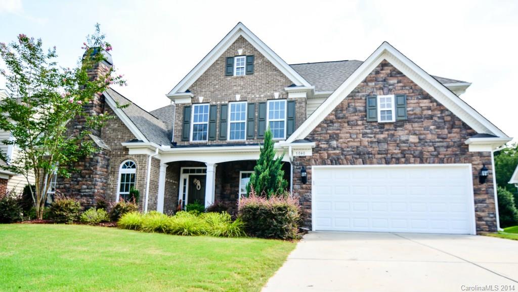 Gorgeous home with hardwood floors, master on main, custom tub tile in master bath, granite counters, gourmet cabinets, two fireplaces (one in great room and one in office/den), french doors to den, large bonus room with extra attic storage space, fenced and private backyard with tree buffer. Walking distance to neighborhood amenities. Too many great things to list! Come see this home today!