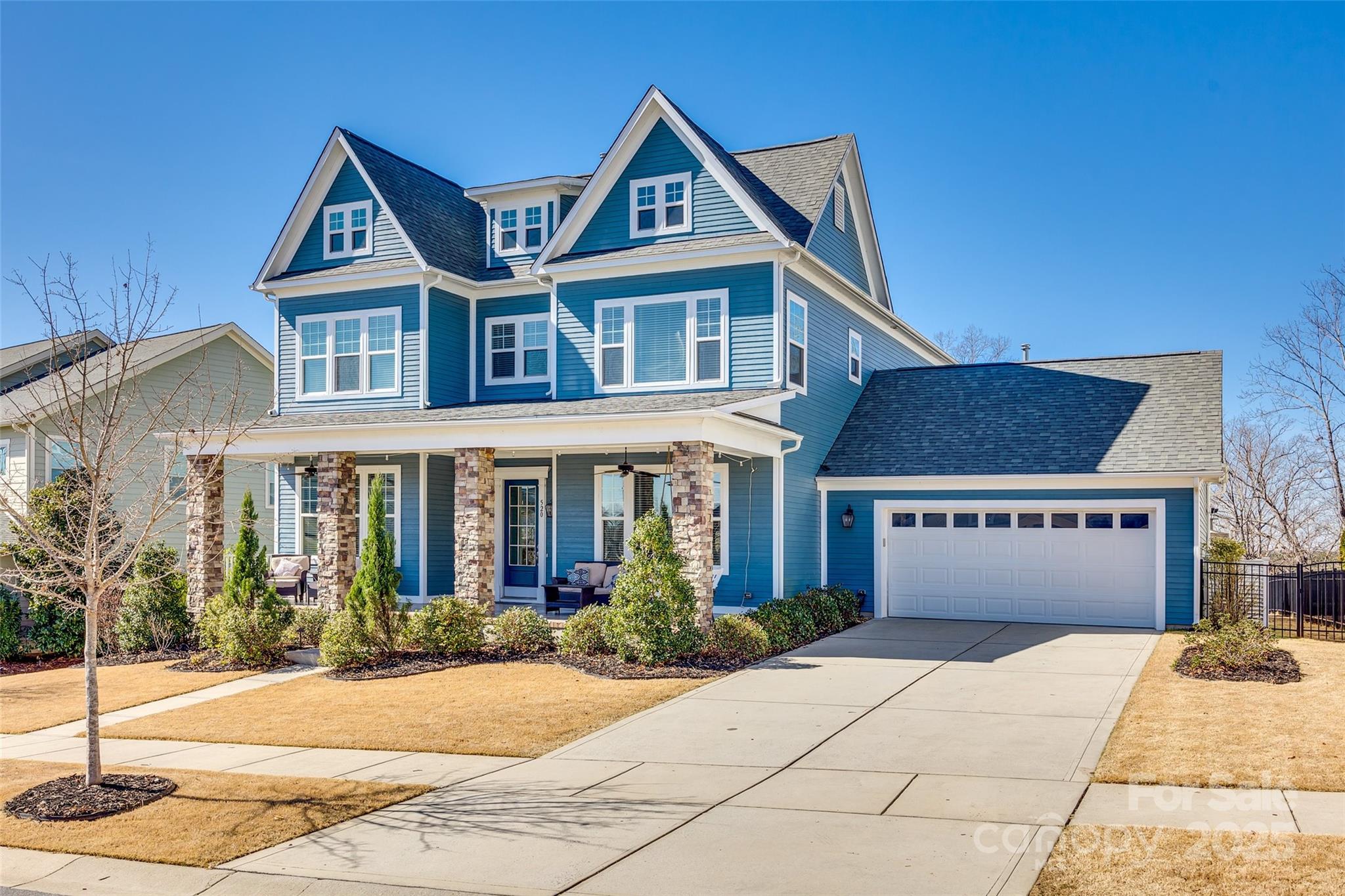 Back on market—no fault of sellers and priced to move! This meticulously maintained Cunnane-built beauty in Masons Bend has it all. The open floor plan connects a chef’s kitchen to a spacious great room and breakfast nook—perfect for entertaining. Enjoy quartz counters, a wine bar, and a rich walnut island, all accented by elegant crown molding throughout. The main-level primary suite is a true retreat with a frameless shower, soaking tub, and dual vanities. Upstairs offers 4 bedrooms (one doubles as a bonus!), plus a loft and 3 full baths—ideal for guests, work-from-home, or play. Relax year-round in the 3-season room or cozy up by the outdoor wood-burning stone fireplace. The fenced backyard with wooded views is made for sunset lovers. Enjoy resort-style living with walking trails, kayak access, clubhouse, fitness center, pool, and more—all minutes from top-rated schools, shopping, dining, and commuter routes!
