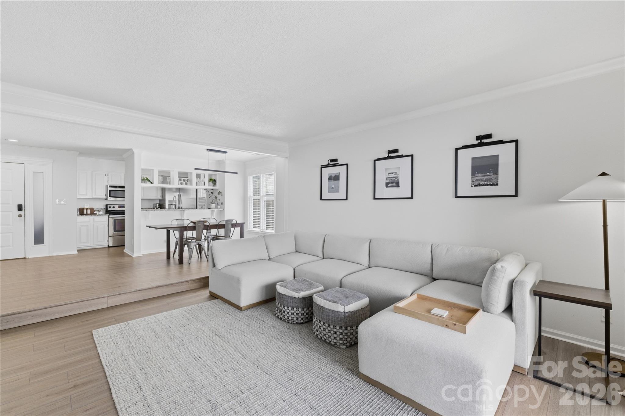 Welcome to effortless living in the heart of Myers Park. This beautifully refreshed 2-bedroom, 2-bath condo combines timeless charm with modern updates, including brand-new LVP flooring and fresh interior paint. Filled with natural light, the open living and dining areas create an inviting space for everyday living and entertaining. The spacious primary suite offers a private retreat with an en suite bath, while the secondary bedroom and full bath provide flexibility for guests or a home office. An oversized private balcony overlooking the community pool offers the perfect spot to relax and unwind. Enjoy low-maintenance living just moments from Freedom Park, Uptown Charlotte, Atrium Health, Novant Presbyterian, and some of Charlotte's most beloved restaurants, coffee shops, and boutiques. Nestled among the tree-lined streets and historic charm of Myers Park, this home offers the opportunity to experience one of Charlotte's most desirable neighborhoods with exceptional convenience and timeless appeal.