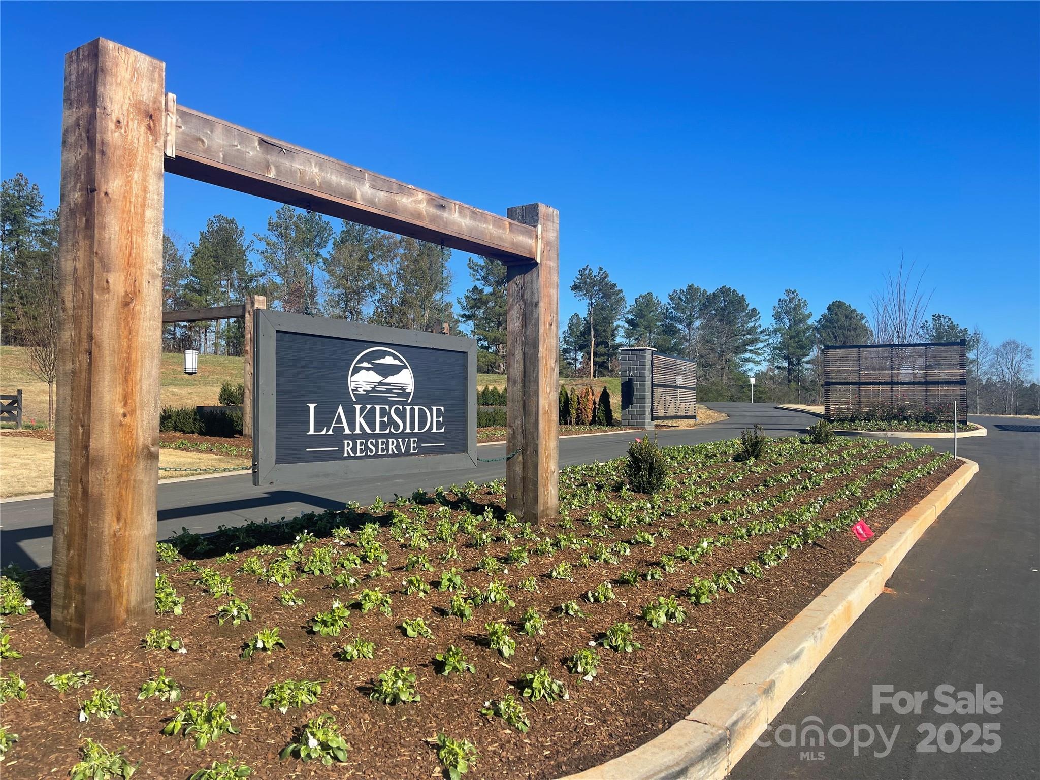 DOCKABLE WATERFRONT LOT – Situated in the sought-after gated community of Lakeside Reserve, this exceptional waterfront lot offers a rare opportunity to build your dream home with breathtaking year-round water views and direct lake access. With dockable shoreline, you’ll have the convenience of launching your boat, fishing, or simply relaxing by the water right from your own backyard.

This lot is perfect for those seeking a tranquil retreat with the added benefit of lakeside adventure. Picture peaceful mornings or evenings spent taking in the serene natural beauty from your private dock.

Lakeside Reserve, a gated community. offers a wealth of amenities designed for both recreation and relaxation. Enjoy a resort-style pool on sunny days, play a match on the pickleball courts, or explore the community’s scenic walking trails. This unique blend of natural beauty, water access, and neighborhood comforts makes this a standout opportunity for true lakeside living.