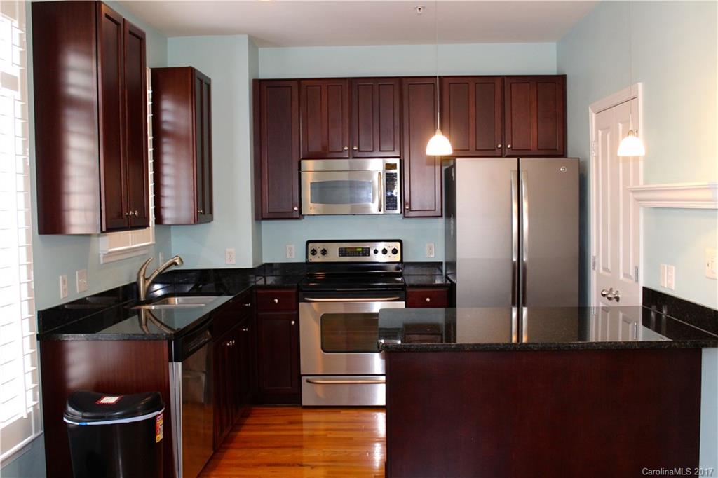 This 2 bed/2.5 bath townhouse is located in Elizabeth Village with 2-car garage and is located within walking distance to everything that Elizabeth/Plaza Midwood have to offer. Less than two miles from Uptown Charlotte. This light-filled unit is loaded with upgrades: hardwood floors, upstairs and down, plantation shutters, custom light fixtures, custom drapes and window seat in bay window, master bath with dual vanities and a private balcony off master suite! Washer and dryer included.
