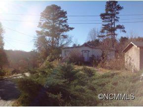 Fixer upper in West Asheville that has a huge lot (buyer agent to confirm subdividing). Home needs a lot of work but its in a great spot. Above the home is an already graded lot that has some views and will make for an easy build. Make an offer!