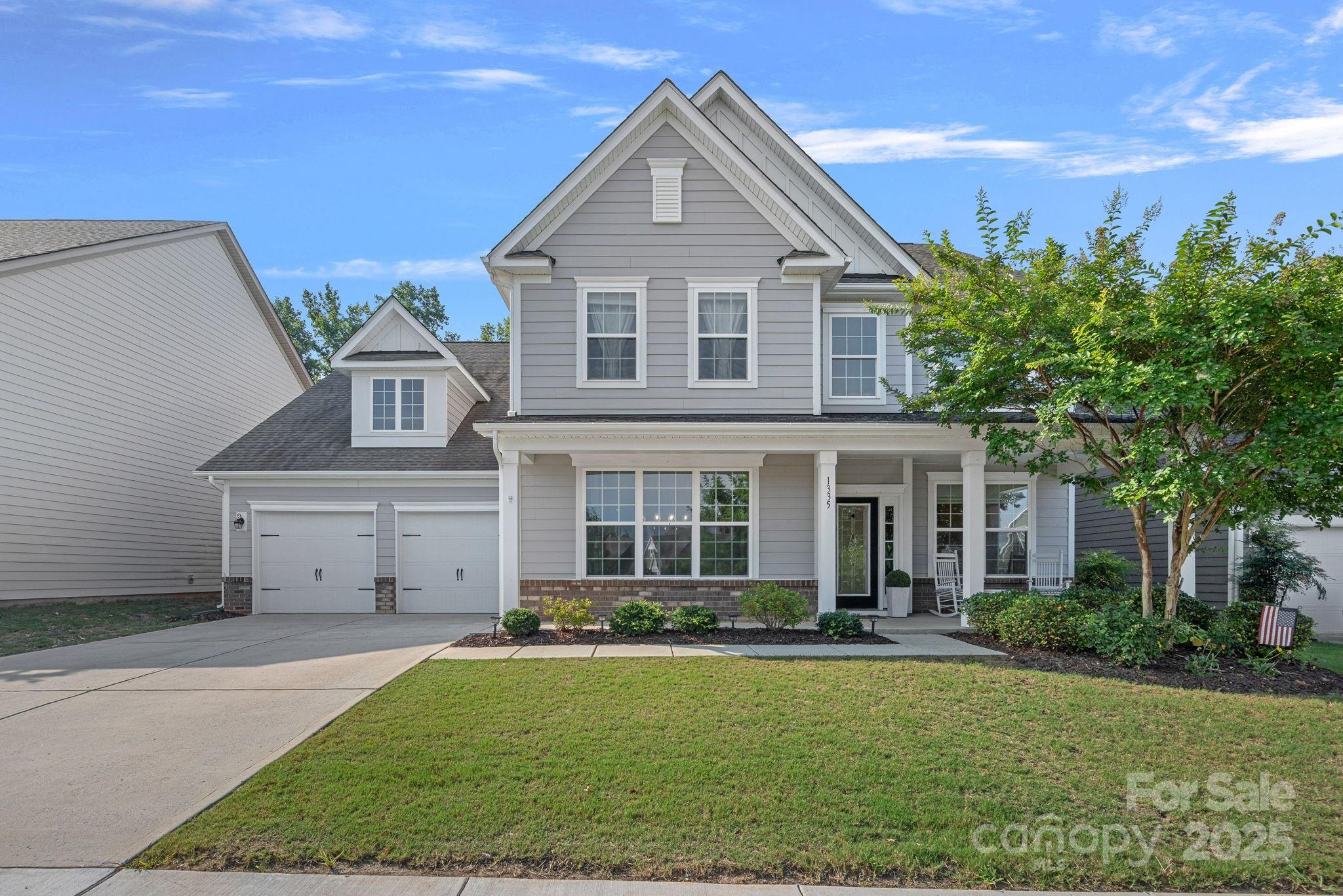 Welcome to this spacious 5-bedroom, 3.5-bathroom home in the heart of Fort Mill! Featuring a main-level primary suite with a massive walk-in closet, this home blends comfort and functionality. The open-concept kitchen is a chef’s dream with granite countertops, stainless steel appliances, gas cooktop, double wall ovens, and ample cabinet space. Enjoy year-round relaxation in the large heated and cooled sunroom, or step outside to the brand-new paver patio (2024) overlooking the fully fenced backyard. Upstairs offers a flexible layout with a Jack-and-Jill bath, additional guest room, and a large bonus/5th bedroom. Located in a vibrant community with resort-style amenities including a pool, clubhouse, tennis/pickleball courts, nature trails to the river, and a playground. Zoned for top-rated Fort Mill schools!