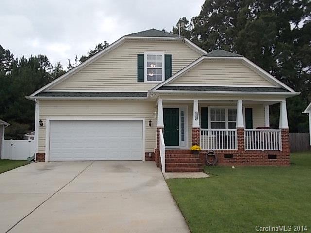Qualifies for 100% USDA financing. No city taxes. 3BR/2BA with Bonus Room upstairs. Vaulted Ceilings, plant shelves, laminate wood flooring (no carpet). Kitchen has been updated and has 42 inch upper cabinets, beautiful high definition laminate tops, and all appliances including refrigerator.. 2 car garage with opener. Rocking chair front porch, Fireplace, fenced yard.  Tankless hot water heater. HOME WARRANTY!