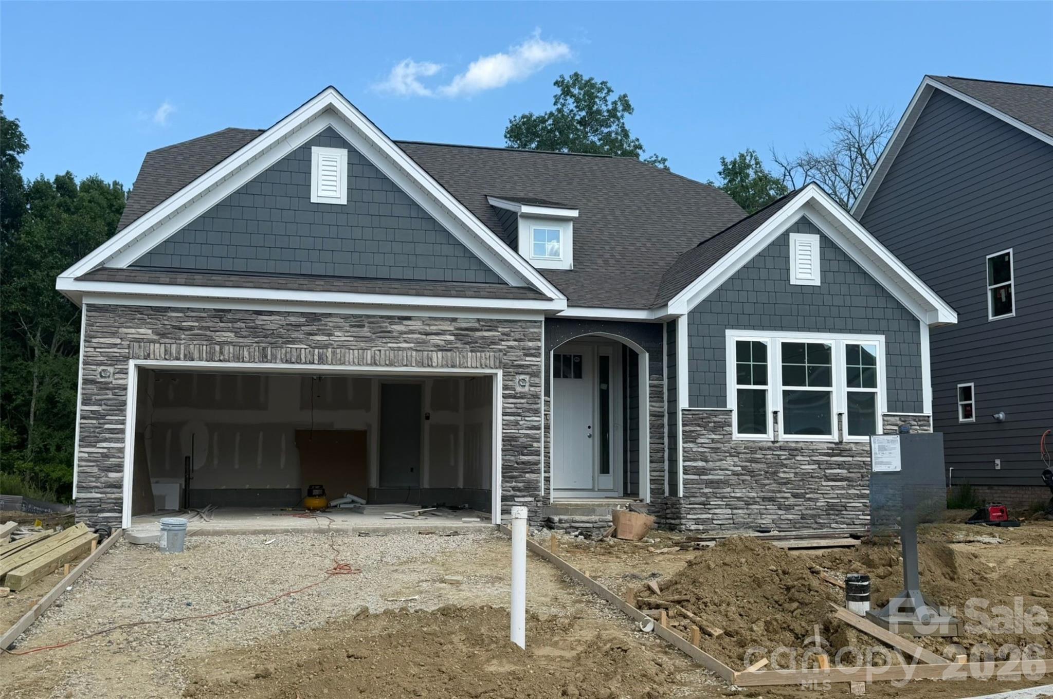 Welcome to a brand-new community close to Catawba River! This 1.5-story Avery plan has 3 bedrooms, 3 full baths, and more than 2,500 square feet of living space. The main level features an office with French doors and wainscoting, a family room with a gas fireplace, the primary suite, breakfast area, and kitchen. The designer kitchen has quartz countertops, white cabinetry with a contrasting island, a tile backsplash, and stainless appliances, including a gas cooktop, designer range hood and wall oven & microwave. The primary bedroom has a tray ceiling, and the primary bathroom has a luxury bath with tiled shower and tub with tile surround. The main floor also includes another bedroom, a full bath with a 4-ft shower with bench seat, and the laundry room. The upper floor has a loft with a huge, finished storage closet, a bedroom, and a full bath with a tub/shower combo. Visit today and find out more about this beautiful home and community!