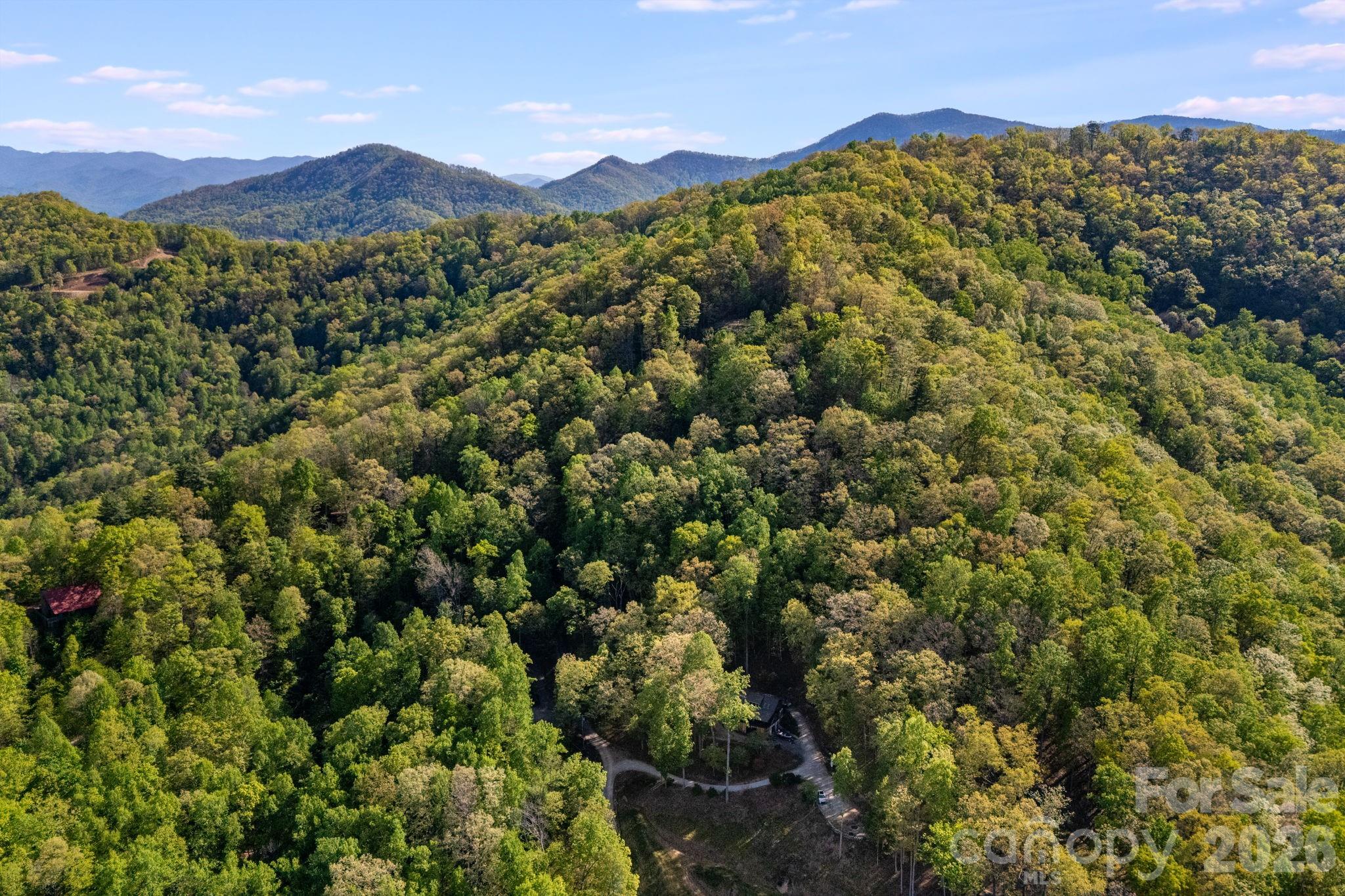 Welcome to 841 Laurel Spring Drive! 2.24 acres with long range mountain views and improvements already in place. Power at property, and homesite graded. Build your dream cabin getaway, or simply bring your camper and enjoy the stars. This lot could the perfect basecamp for your WNC adventures! Nantahala National Forest, Great Smoky National Park, Fontana Lake, the Tuckaseegee River- all within a short drive. 15 minutes to Bryson city. 25 Minutes to Cherokee. 10 Miles to Tsali trailhead and all that Fontana Lake has to offer. Lots also listed together with adjacent lot under mls:4373981
