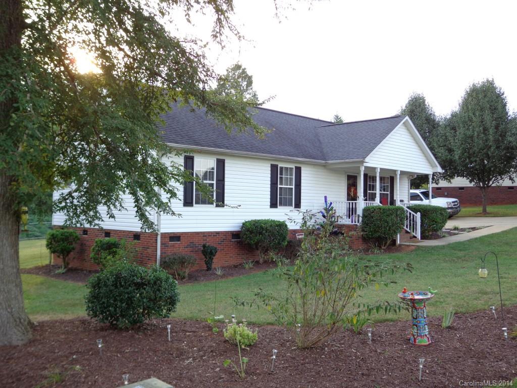 Meticulously cared for ranch home nestled on 1 acre in the country! Drive in the tree lined driveway to your own slice of tranquility! The rocking chair front porch has great views of open pasture & farmland. Enter the home thru the front door & take a load off in the large living room or enjoy cooking a meal in the upgraded kitchen with ss appliances & ceramic floors. 2nd and 3rd bedrooms have large closets. Master suite has private bath with walk in closet! Back deck overlooks fenced in yard.