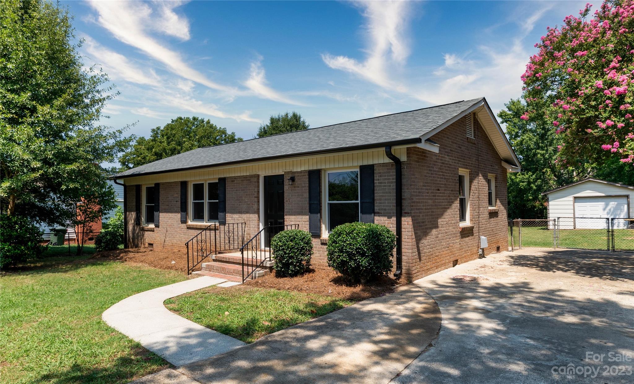 Hurry and come check out this freshly updated cute brick ranch-style home! This one features a new roof (2022), a new HVAC, and a new water heater. It also boasts granite countertops, a fenced-in backyard, hardwood floors, and a 16ft deck off the back perfect for relaxing and enjoying your new home!