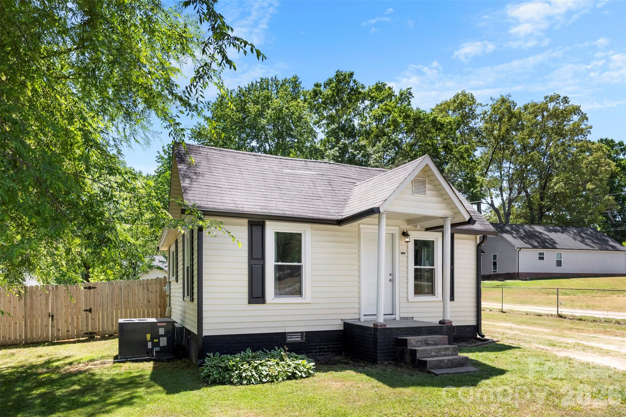 Back on the market at no fault of the seller! Welcome to this charming home in the heart of Kannapolis! This cozy 2 bedroom, 1 bath home offers the perfect blend of comfort and convenience--just minutes from I-85, shopping and dining. Inside, you'll find an updated kitchen featuring beautiful granite countertops, modern laminate wood flooring, and plenty of natural light through the new windows! Step outside to enjoy a spacious, fully fenced backyard with a great sized deck--ideal for pets, entertaining, or simply relaxing! Whether you're a first time homebuyer looking for an affordable start or an investor searching for a solid rental opportunity, this property checks all the boxes! Don't miss your chance to own a low maintenance home in a prime location--schedule your showing today!