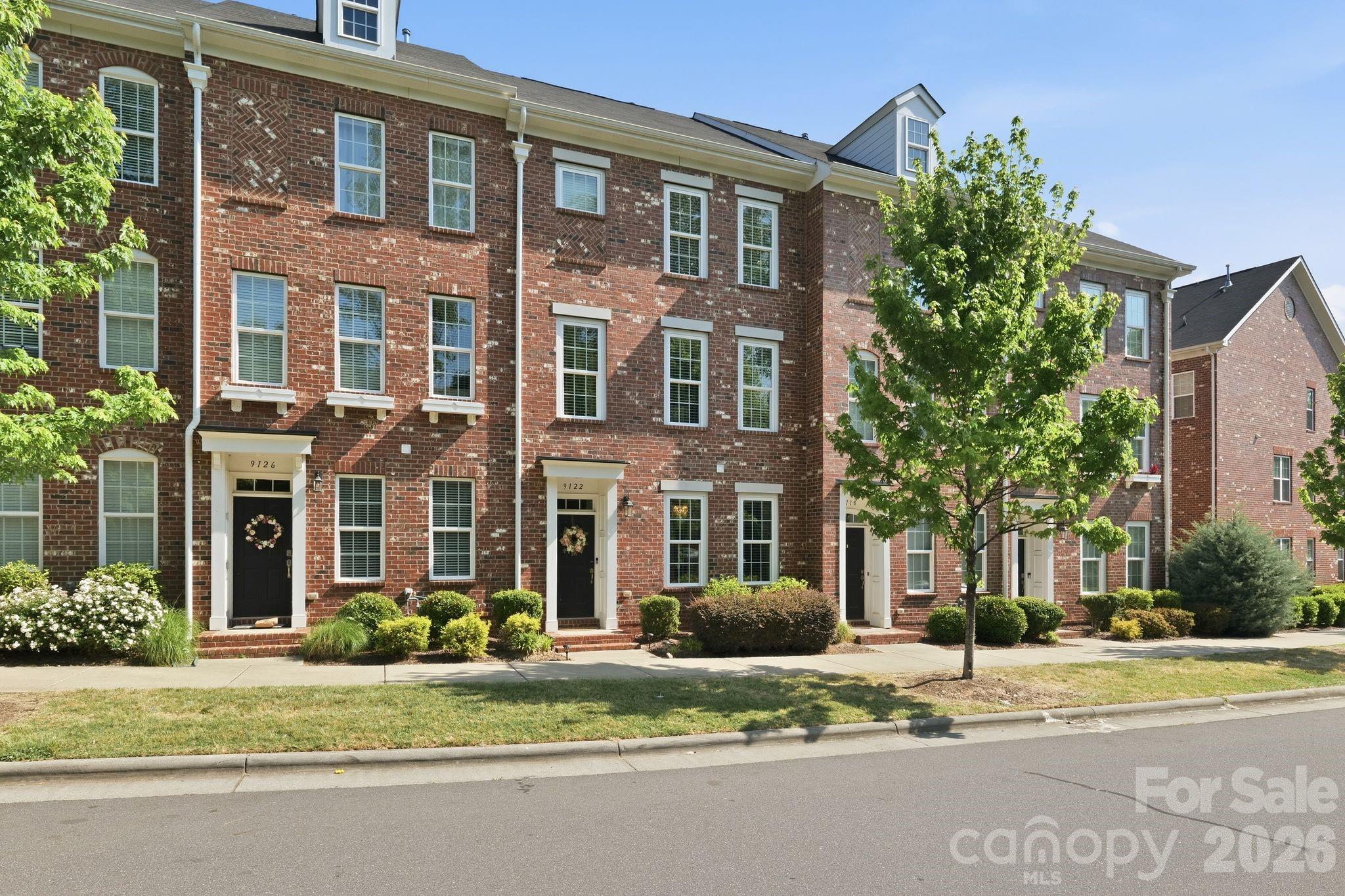 Welcome to the most desired custom luxe townhouse available in Charlotte, NC! This rare 4-bedroom townhome located in the highly desired Ayrsley neighborhood has so much to offer that you must see it for yourself. This home was built to stay, not sell so the owners cut no corners with custom lighting, fresh paint, freshly stained stairs, custom flooring and countertops, custom cabinetry, coffee bar, balcony, upgraded bathroom, and so very much more! 2 car garage allows private parking in one of the most convenient locations in the city. While this home may feel like a high end resort with it's upscale living and decor, it's ready for you to call it home today!
