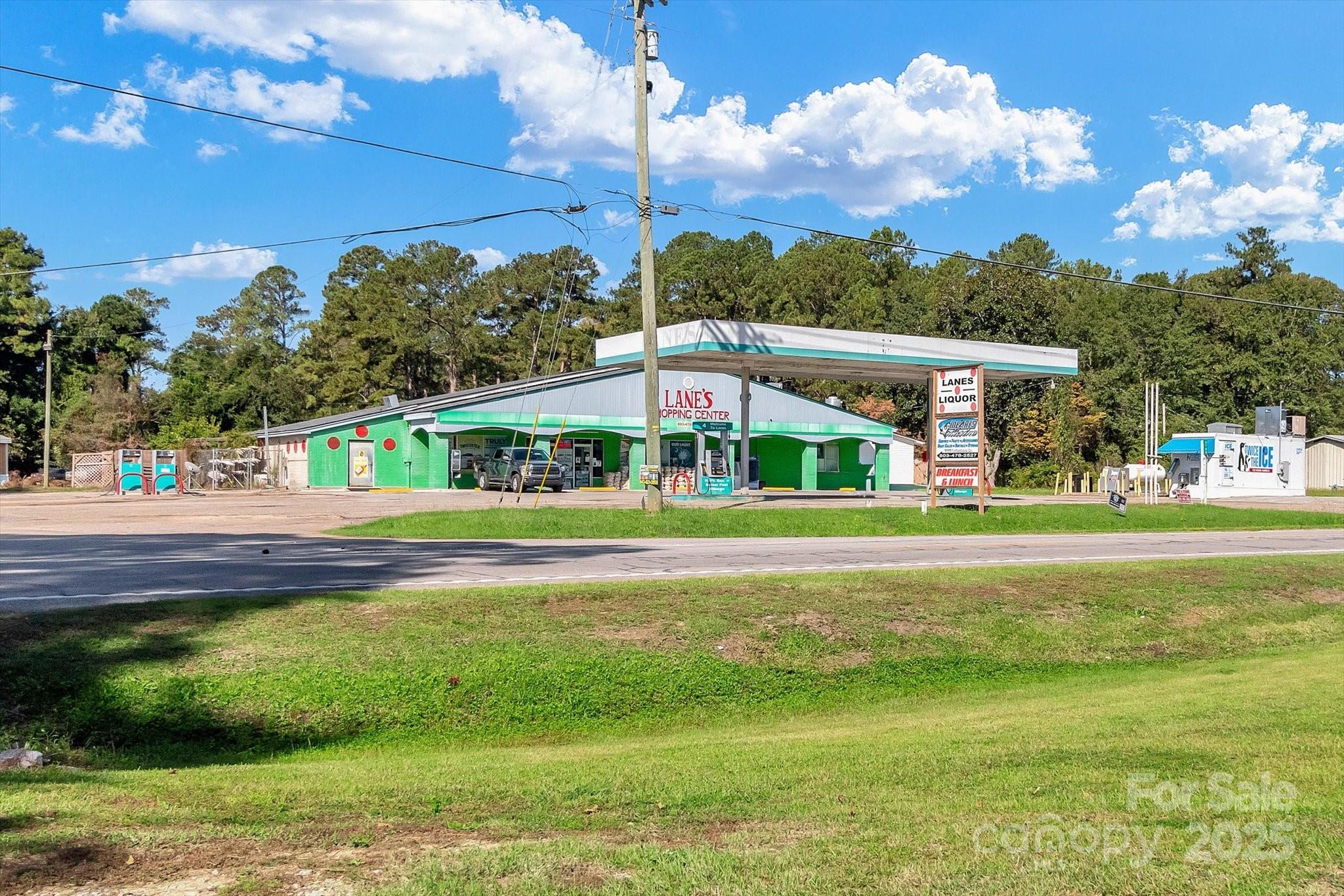 Lane’s Shopping Center – Exceptional Investment Opportunity in Manning, SC
Discover an incredible opportunity to own a thriving, multi-income property package in the heart of Manning, South Carolina. This offering includes the well-established Lane’s Shopping Center, featuring a gas station, convenience store, restaurant, and liquor store—all in full operation with a loyal local customer base and long-standing community reputation. The business is completely turnkey and ready for the next owner to continue its successful legacy as one of Manning’s most recognized and well-loved destinations.
The main commercial structure has been recently upgraded with a brand-new roof (2025), ensuring peace of mind and long-term durability. Adjacent to the business is a fully renovated home, ideal for owner occupancy or rental income potential. In addition to the main property, this unique portfolio includes five residential properties, providing multiple revenue streams or future development opportunities.
Included Addresses:
• 9710 Hwy 260, Manning, SC 29102
• 98708 Hwy 260, Manning, SC 29102
• 2309 Lake Shore Dr., Manning, SC 29102
• 1069 Bait Ln., Manning, SC 29102
• 1033 Bait Ln., Manning, SC 29102
• 1590 Pocahontas Cir., Manning, SC 29102
With strong existing cash flow, established clientele, and valuable real estate in a high-visibility area near Lake Marion, this is a rare chance to acquire both a profitable operating business and significant property assets. Ideal for investors, entrepreneurs, or families seeking a live-work setup in a growing community.
Don’t miss this exceptional opportunity to own a proven business and real estate package with endless potential in beautiful Manning, South Carolina.