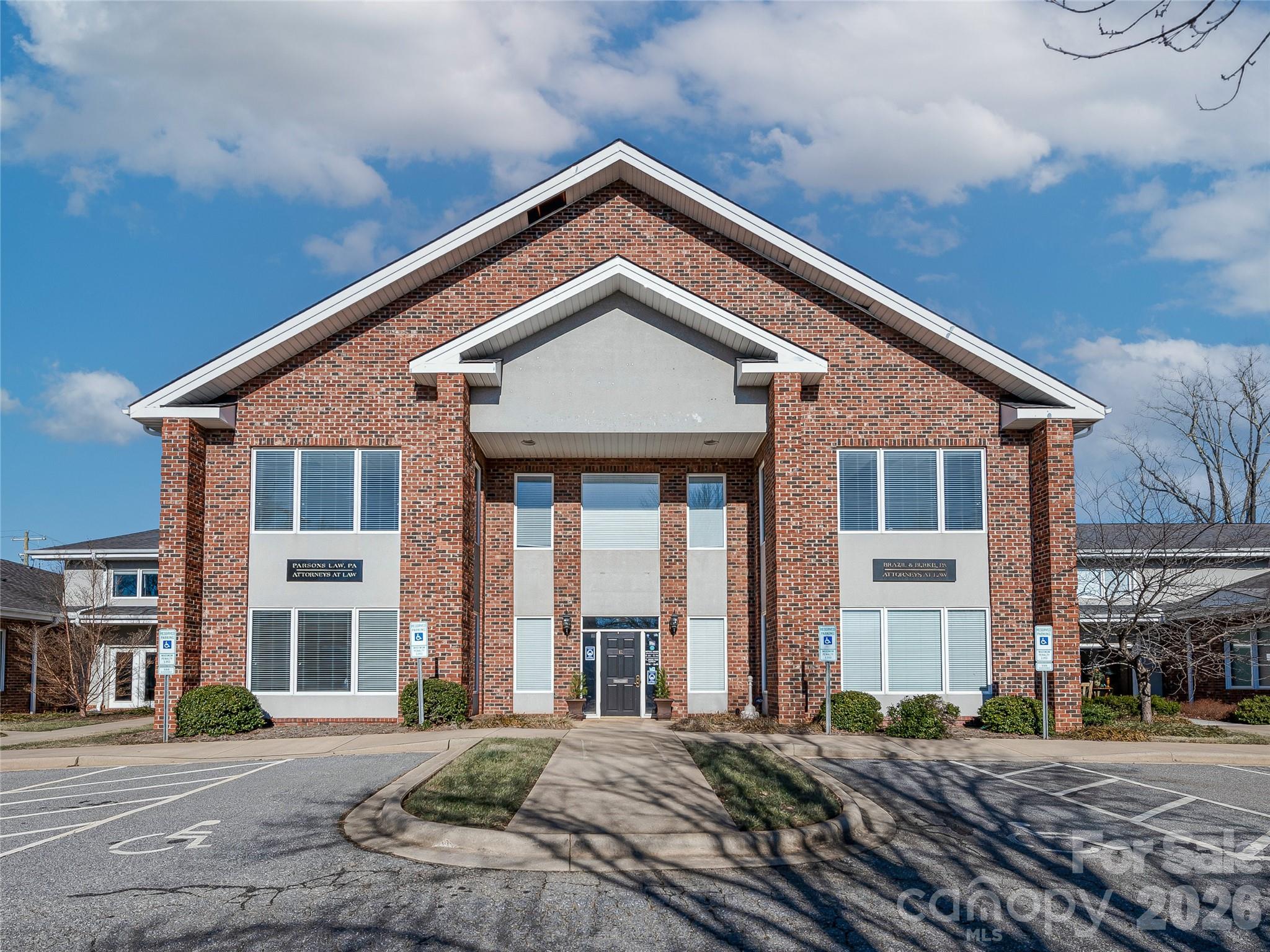 Positioned within a well-established professional office park in central Asheville, this ±6,613 SF two-story office building offers an excellent opportunity for professional or service-oriented users seeking a convenient and accessible location. The property features four bathrooms, functional multi-level space suitable for a variety of office configurations, and ample parking within a shared lot for tenants and visitors. Surrounded by long-term professional co-tenants, the setting provides a stable and business-focused environment. Centrally located near downtown Asheville and the Tunnel Road commercial corridor, the property offers close proximity to a variety of restaurants, retail, and service amenities, while providing convenient regional access approximately 1 mile to I-240, 4 miles to I-40, and easy connectivity via major corridors including Tunnel Road (US-70) and Charlotte Highway (US-74A). Zoned O2, the property supports a variety of professional office and institutional uses.