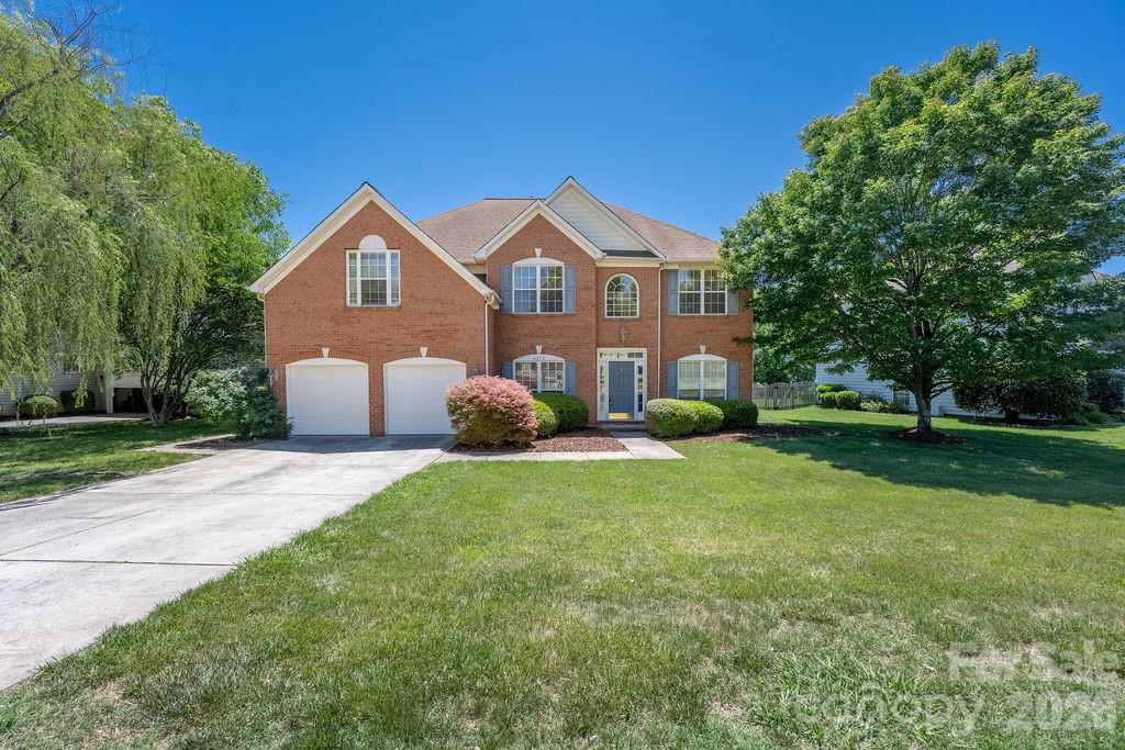 Welcome home to 9512 Autumn Applause Drive, a beautifully maintained residence offering a functional floor plan in an unbeatable location. Nestled in the heart of Blakeney, this home is just minutes from Blakeney Town Center, shopping, dining, the greenway, I-485, and Ballantyne, all within a highly sought-after top-rated school district. Upon entry, you’re welcomed by soaring ceilings, warm neutral tones, elegant crown molding, and abundant natural light throughout. The inviting living room features cathedral ceilings, a cozy fireplace, and a beautiful wall of windows, seamlessly flowing into the dining area and kitchen. The kitchen is well-appointed with granite countertops, stainless steel appliances, a center island, and ample cabinetry, making it ideal for both everyday living and entertaining. The main level also includes a dedicated office, formal dining room, and a bright sitting room just off the kitchen. Upstairs, the spacious primary suite showcases a tray ceiling, private sitting area, walk-in closet, and an ensuite bath complete with dual vanities, a separate shower, and garden tub. Additional highlights include generously sized secondary bedrooms, a two-car garage, and a patio overlooking a level backyard perfect for outdoor enjoyment. This exceptional home offers the ideal blend of location, layout, and lifestyle in one of South Charlotte’s most desirable communities.
