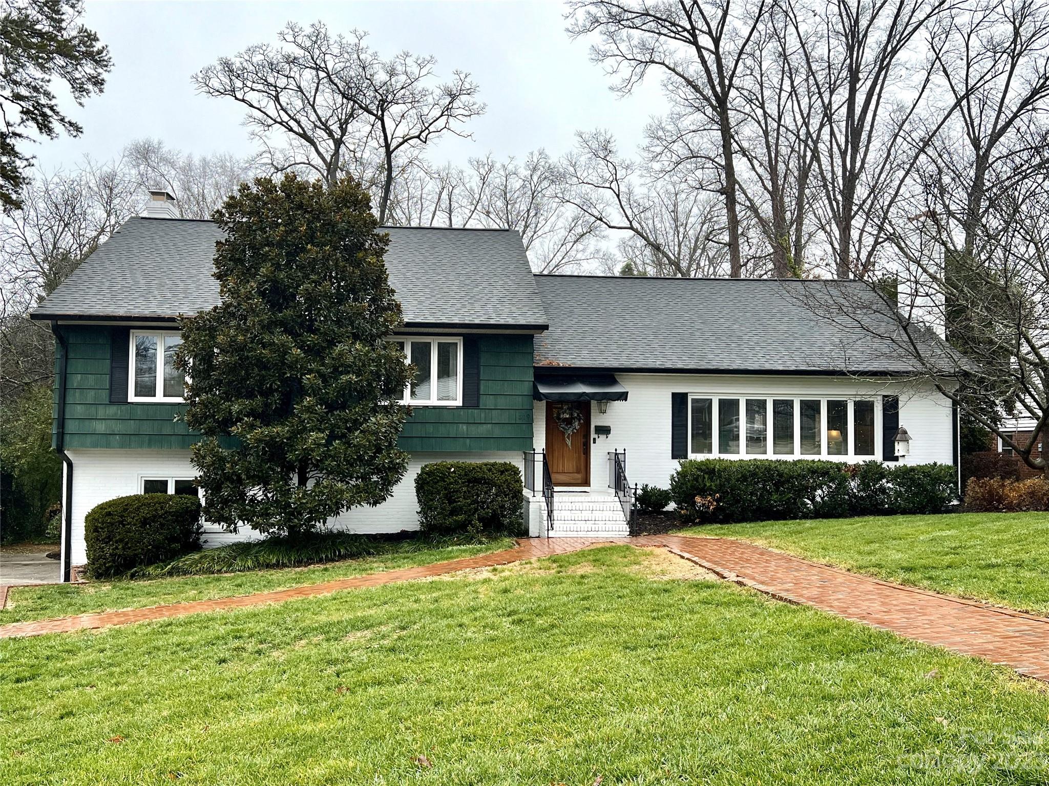 Situated in the heart of Forest Hills: established neighborhood in downtown Albemarle & just blocks away from the medical complex/hospital.  Convenient to shops, dining, parks & recreational facilities.  Established landscaping & fenced in rear yard.  Split level design - main level features: nice entry foyer, formal living(24X15) w/ fireplace, dining(13X17) w/ mirrored wall & patio doors leading to deck, updated kitchen with custom cabinetry & granite counter tops - hardwood floors.  Upper-level features spacious owners suite (19X18) & newly remodeled bathroom w/ multiple head shower & dual vanity, dual closets for plenty of storage.  Two additional bedrooms all containing cedar lined closets.  Lower-level features guest bedroom, bar area & large den (30X14) w/ fireplace & built in cabinetry which leads to a covered patio.  Basement level - contains laundry area & rec/bonus space.  Basement along w/ huge walk-up attic provides plenty of room for storage. Stunning & move in ready.
