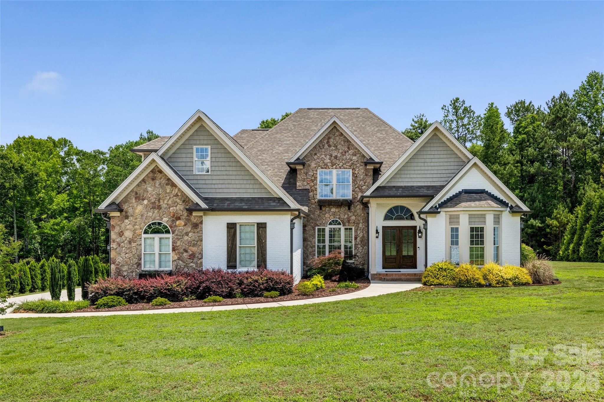 BEAUTIFUL ALL BRICK HOME ON 1 ACRE WITH ALL OF THE FEATURES YOU HAVE BEEN LOOKING FOR! 4 Beds, 3 full baths, w/ Bonus Room. Master Down w/ Trey Ceilings, Large Remodeled Master Bath, Dual Vanities, Soaking Tub, Tiled Shower, Private Toilet, and Custom Shelving Walk in Closet. 2nd Bedroom and renovated full bath down for potential in-law suite. Formal Office, Dining Room, and Large Sunroom Area off of Kitchen. Large Vaulted Living Room w/ tons of Natural Light, Built-in Shelving, and Gas Fireplace with Custom Surround. Beautifully Renovated Kitchen w/ White Cabinets, Quartz Counters, Tile Backsplash, Pot Filler, Custom Hood, and Stainless Appliances. 2 Bedrooms Up w/ Renovated Jack/Jill Baths. Huge Bonus Room! Rear Patio with Outdoor Kitchen w/ plumbed grill, cooktop, sink, and Gas Fireplace thats perfect for Entertaining! Detached 2-Car 30x30 Heated/Cooled Workshop plumbed with Electric, Gas, and Water. Front Porch on Work Shop is Perfect for Relaxing and Watching the Sunset. Attached 3-Car Side Load Garage. New Roof and Gutters in 2024! New Hardwoods. New Custom Front Door. Fresh Paint. Updated Light fixtures. Newer HVAC in Workshop. NO HOA! The List goes on!