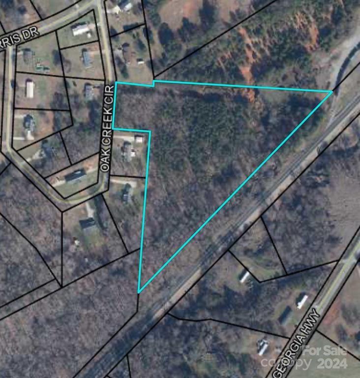 8.71 acres in great Macedonia location. Come build your dream home, develop a mini-farm, or multi-family development. Mostly wooded with creek access. Address is estimate only. Nearest address is 113.