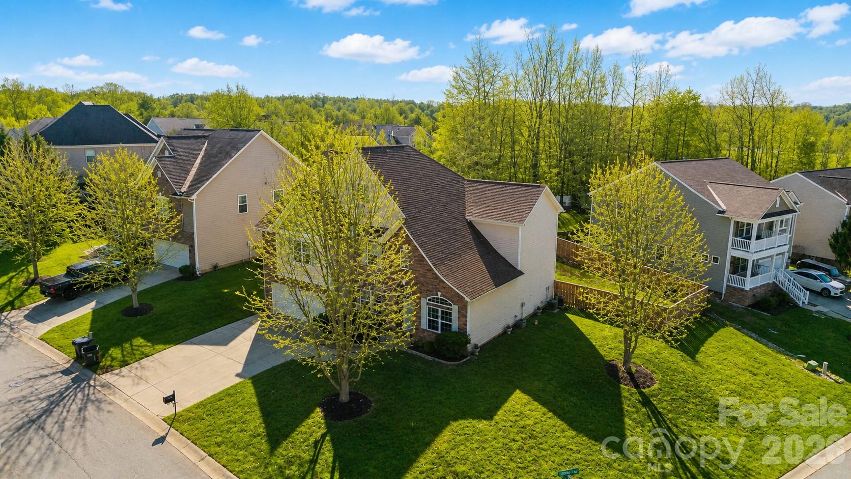 Looking for more space without paying Charlotte or Fort Mill prices? 

3,451 Sq Ft | Clover Schools | Minutes to Charlotte + Charlotte Douglas Airport | Under $600,000

Welcome to 831 Irish Green Drive, a beautifully maintained 3,451-sqft home in the highly sought-after Mill Creek Falls community, offering the space, flexibility, and lifestyle today's buyers are searching for.

From the moment you enter, you'll notice soaring ceilings, abundant natural light, and a layout designed for the way people actually live. Whether you work remotely, homeschool, entertain frequently, or simply need room to spread out, this home delivers.

The main level features a dedicated home office, spacious living area, formal dining room, oversized kitchen with gas cooking, large center island, walk-in pantry, breakfast area, and a bright sunroom that quickly becomes everyone's favorite place to relax. The open-concept design keeps everyone connected while still offering distinct spaces for work, dining, and everyday living.

Upstairs, you'll find four generously sized bedrooms, including a spacious primary suite with dual vanities, garden tub, separate shower, and walk-in closet. A large loft/media room provides valuable bonus space perfect for movie nights, gaming, fitness equipment, play space.

Step outside to enjoy the fully fenced backyard, expanded patio, and level corner lot tucked within a quiet cul-de-sac setting. There's plenty of room for pets, gatherings, gardening, or simply enjoying the outdoors.

Recent improvements provide added peace of mind, including a newer roof, fencing, patio expansion, updated fixtures, and thoughtful maintenance throughout.

Mill Creek Falls residents enjoy resort-style amenities including a pool, clubhouse, playground, walking trails, tennis courts, pickleball courts, recreation areas, and fishing pond access. Located just minutes from the North Carolina border, you'll enjoy award-winning Clover Schools, lower South Carolina taxes, and convenient access to Charlotte, Lake Wylie, shopping, dining, and major employment centers.

Homes offering this much flexible living space, a fenced yard, dedicated office, sunroom, loft, and exceptional location are becoming increasingly difficult to find at this price point.

Schedule your private showing today and discover why so many buyers are choosing Clover for more home, more value, and more lifestyle.