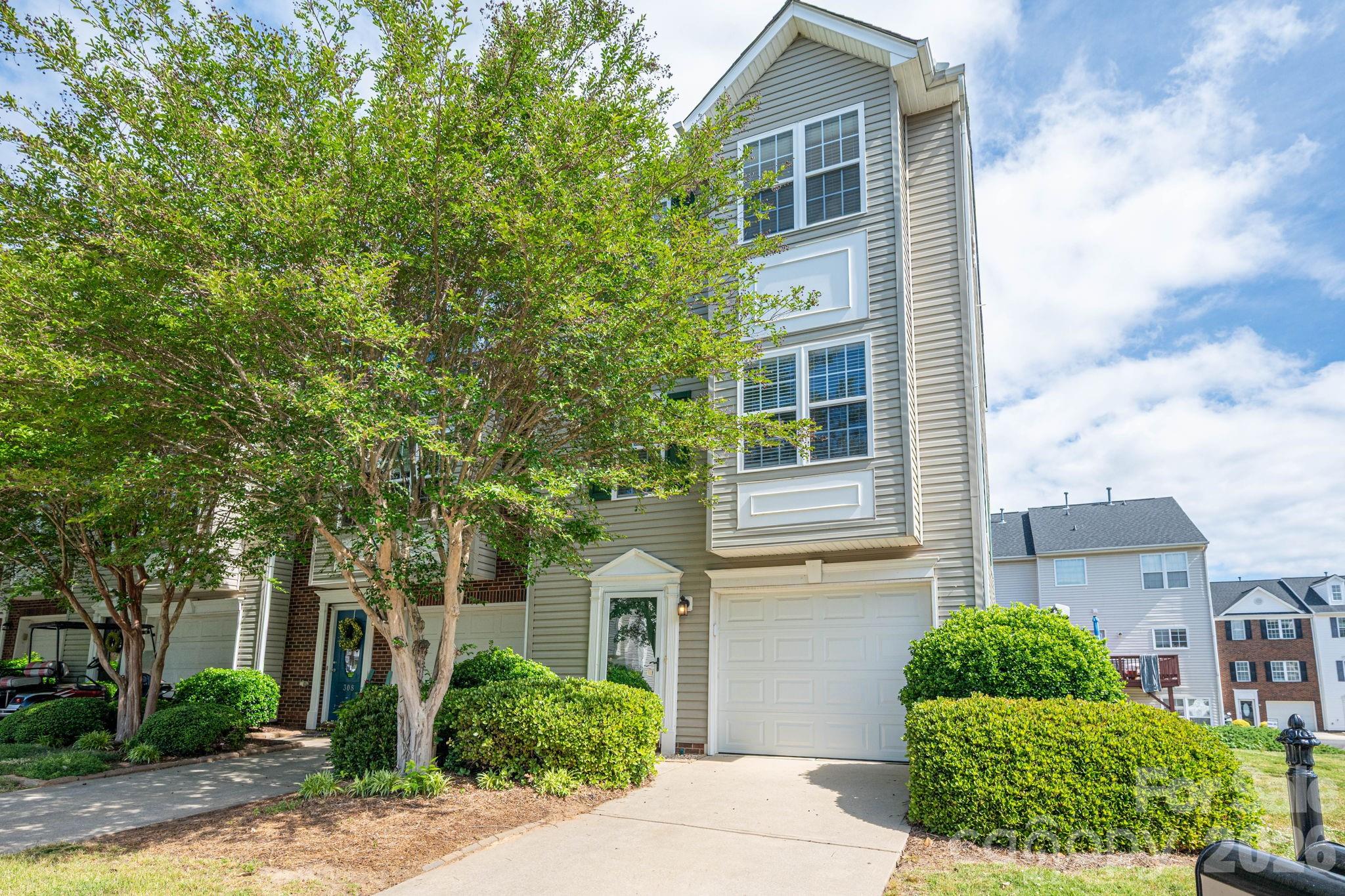Welcome to this beautifully designed end unit townhome in the sought-after Riverfront community of Mount Holly. Thoughtfully laid out across three levels, this home offers both flexibility and modern comfort.

The lower level features a versatile bedroom or bonus room—perfect for guests, a home gym or office, or additional living space—along with direct access to the garage. The main level is the heart of the home, showcasing a wide-open layout that seamlessly connects the living room, kitchen, and dining area. Step outside onto the deck just off the main level—an ideal space for morning coffee, grilling, or unwinding in the evenings.

Upstairs, you’ll find three additional bedrooms, including a spacious primary suite with a private ensuite bath, offering a relaxing retreat.

This vibrant community is packed with amenities designed for an active lifestyle, including an Olympic-sized swimming pool, playground, and multiple launch points for kayaks and paddleboards right in the neighborhood. A restaurant located adjacent to the community adds an extra layer of convenience for dining and gathering close to home.

All of this is located just minutes from both downtown Mount Holly and Belmont, offering easy access to local dining, shopping, and year-round community events.