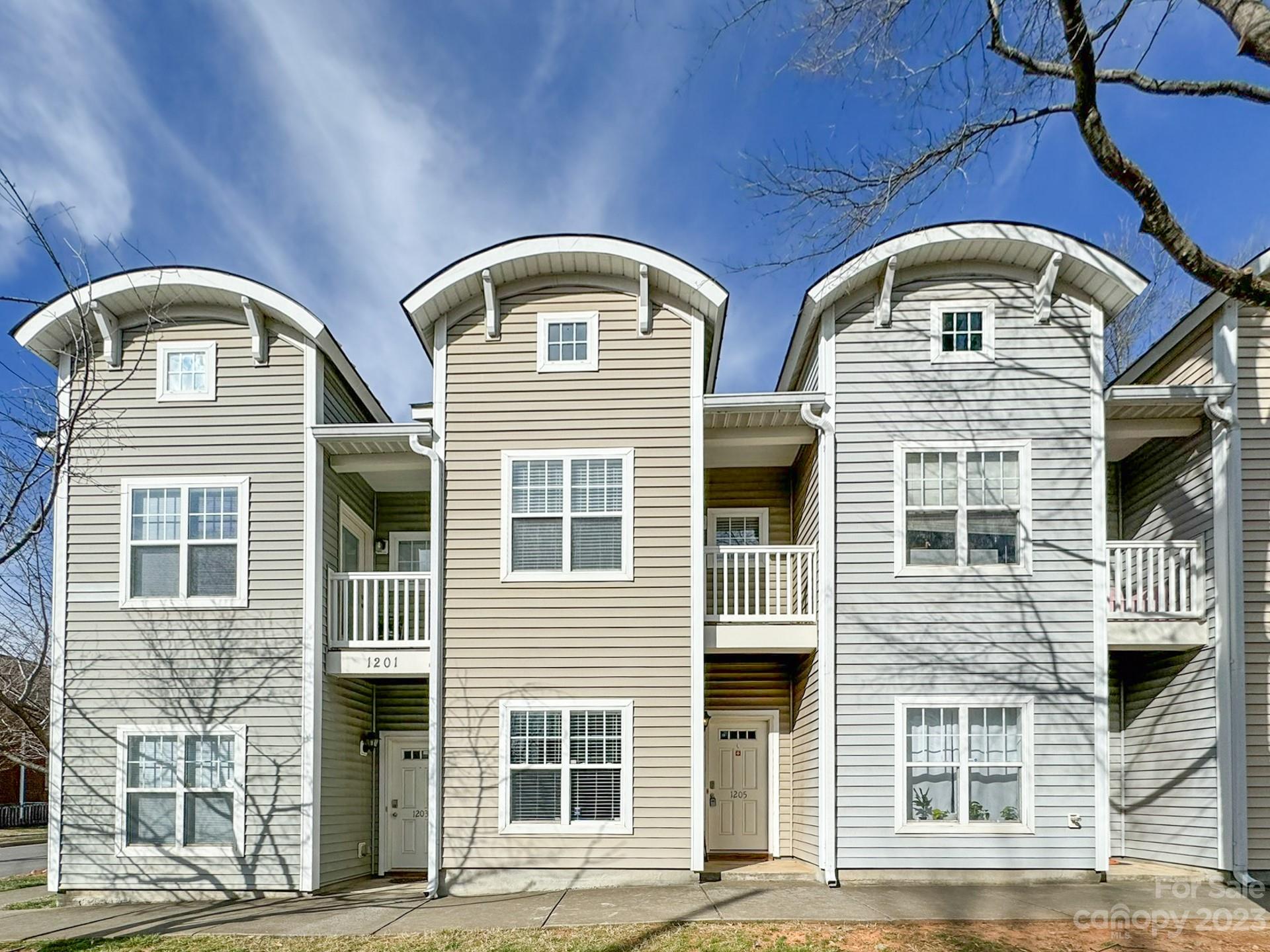 Affordable, urban living at its finest in trendy Optimist Park neighborhood! This rare two-story condo is a hidden gem, offering an unparalleled blend of convenience and style, just outside of center city. Enter the main level into an open-concept kitchen and living room, which is ideal for entertaining. Then retreat upstairs upstairs into the large primary bedroom with a full bath and a private balcony. Walk to nearby Optimist Hall with a myriad of dining options, eclectic bars, and specialty shops. Plus, you are just minutes away from Uptown Charlotte, NODA, Plaza Midwood, Spectrum Center, BOA Stadium with the connectivity of 277 and LYNX Blue Line Extension, your new address will put you in the center of the vibrant city and its action. The property's affordability, coupled with its prime location, makes it an ideal choice for those seeking a starter home or a savvy investment opportunity! Don't miss out on the chance to claim this urban oasis as your own!