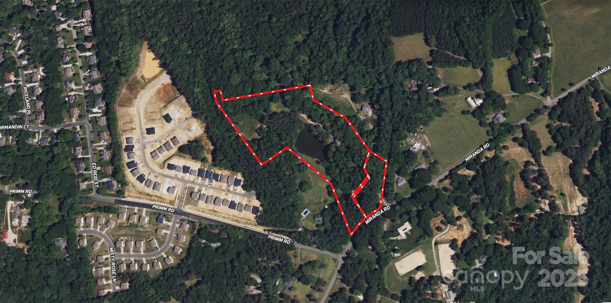 This 11.2+/- acre property with a pond is made up of two parcels and is located in a highly desirable area that is exploding with development.  The property boast over 270+/- paved road frontage on Miranda Rd with city water and sewer are currently at the site.  The topo lays well setting this property up perfectly for development or a private estate. Call listing agent for additional details