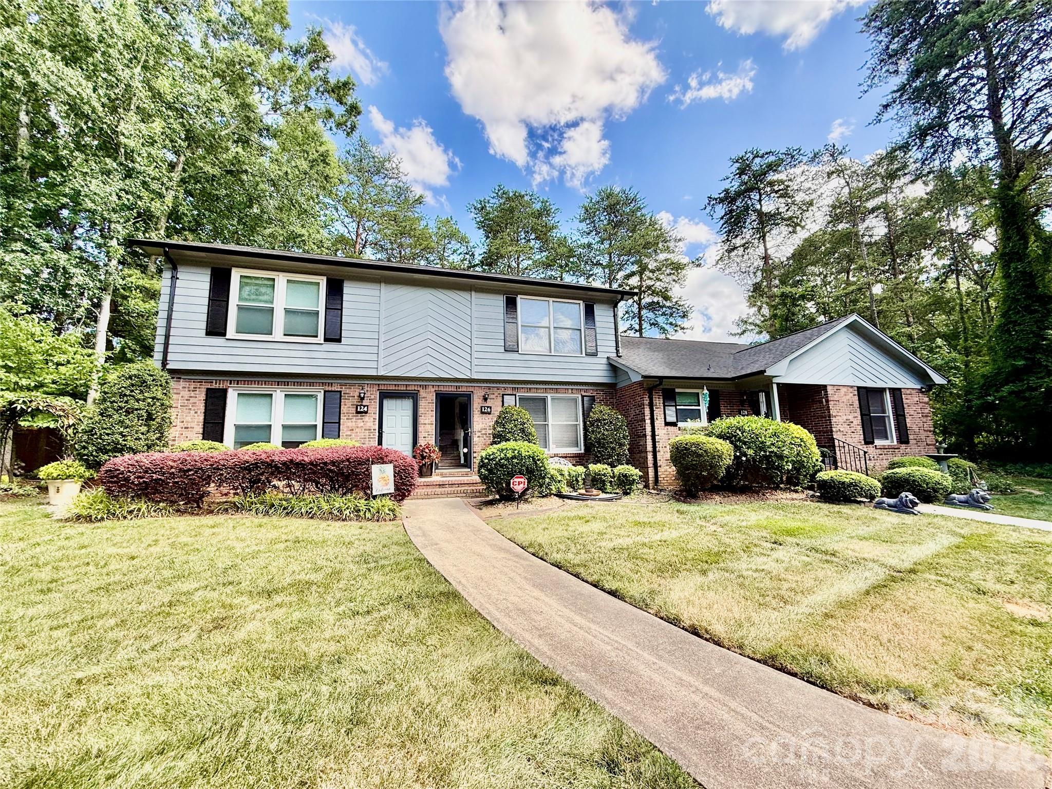 Easy living in this charming condo located in the heart of Fort Mill within walking distance from shops, restaurants, entertainment and convenient to the city of Charlotte and airport. With a spacious open living area downstairs, the kitchen has ample counter space and cabinets. All appliances including washer and dryer remain with the home. There is a walk in laundry room and a large pantry. Upstairs has 2 spacious bedrooms and a central bath. The back patio is private and framed by a beautiful garden and outdoor storage closet. Residents enjoy a shared neighborhood pool. This community is loved for its small town feel, safe neighborhoods and award winning schools.