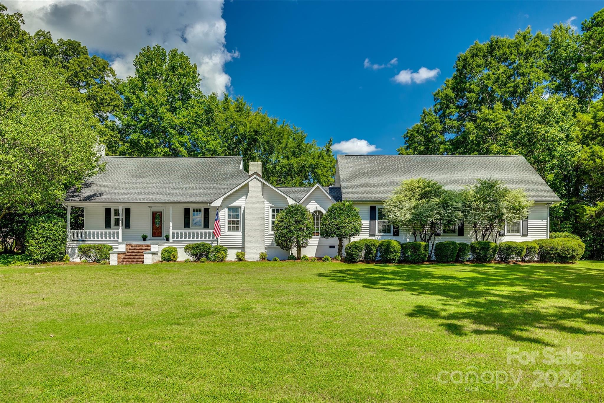 Looking for a quiet, serene location but still want to be close to shopping/restaurants?  Look no further. This home on 2.25 acres is filled with character and is only minutes from Wesley Chapel shopping! Gorgeous wide plank pine flooring, a vaulted ceiling with exposed beams and original wood paneled walls are just a few features that make this home incredibly charming. There are 2 living spaces on the main floor as well as a loft giving you plenty of space to spread out. The kitchen is open to an extra-large sunroom/breakfast area. Family room and all bedrooms have fresh new carpet too. In addition to the welcoming front porch there are several decks to enjoy the quite, private lot. Top-rated Weddington schools! Roof 2013, HVAC unit 2 replaced in 2020 and septic pumped and inspected in 2023. No HOA! Visit this well-maintained home with unlimited possibilities and claim this private retreat as yours today!