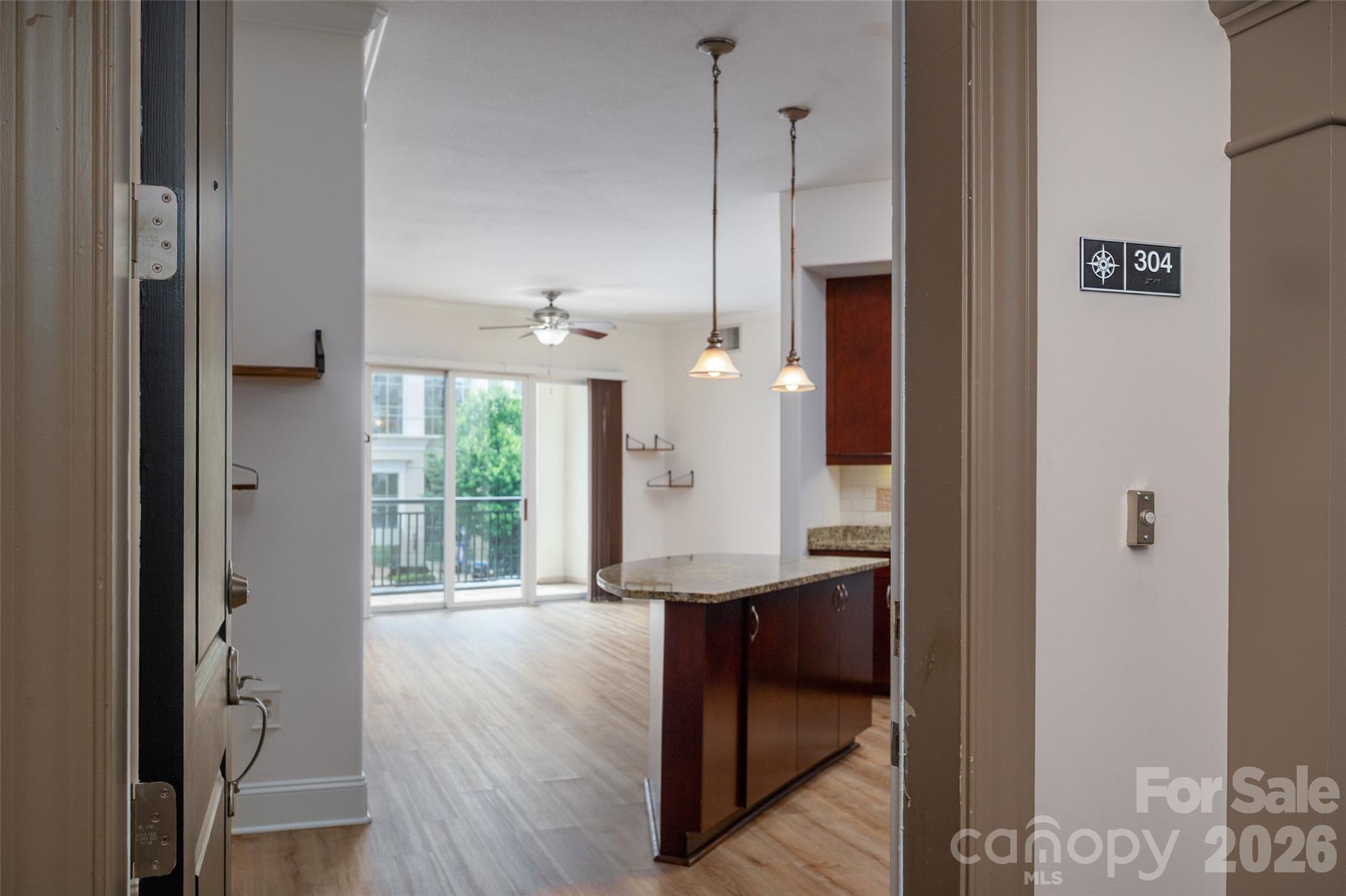Move-in ready meets lock-and-leave convenience in Southpark’s Piedmont Row! This pristine 2BR/2BA condo features an open-concept kitchen with a large island, a spacious living area, and a large balcony overlooking the peaceful fountain and town center shops. The split-bedroom layout offers ultimate privacy, with both bedrooms offering custom walk-in closets and attached full baths.

Enjoy total peace of mind with major recent updates: HVAC & Water Heater (2025), Washer/Dryer (2024), Stainless Appliances (2023), and LVP flooring (2022). Washer/dryer and refrigerator convey! Includes 2 deeded parking spaces.

Piedmont Row features top-tier amenities including a rooftop pool, grilling terrace, clubroom, rec room, and 24-hour security. Ample options for dining, coffee, beauty services, and a YMCA are right downstairs plus high-end Southpark Mall is adjacent. All this and zoned for top-rated schools! Investors welcome with no rental cap and 12-month lease minimums. Schedule your tour today!