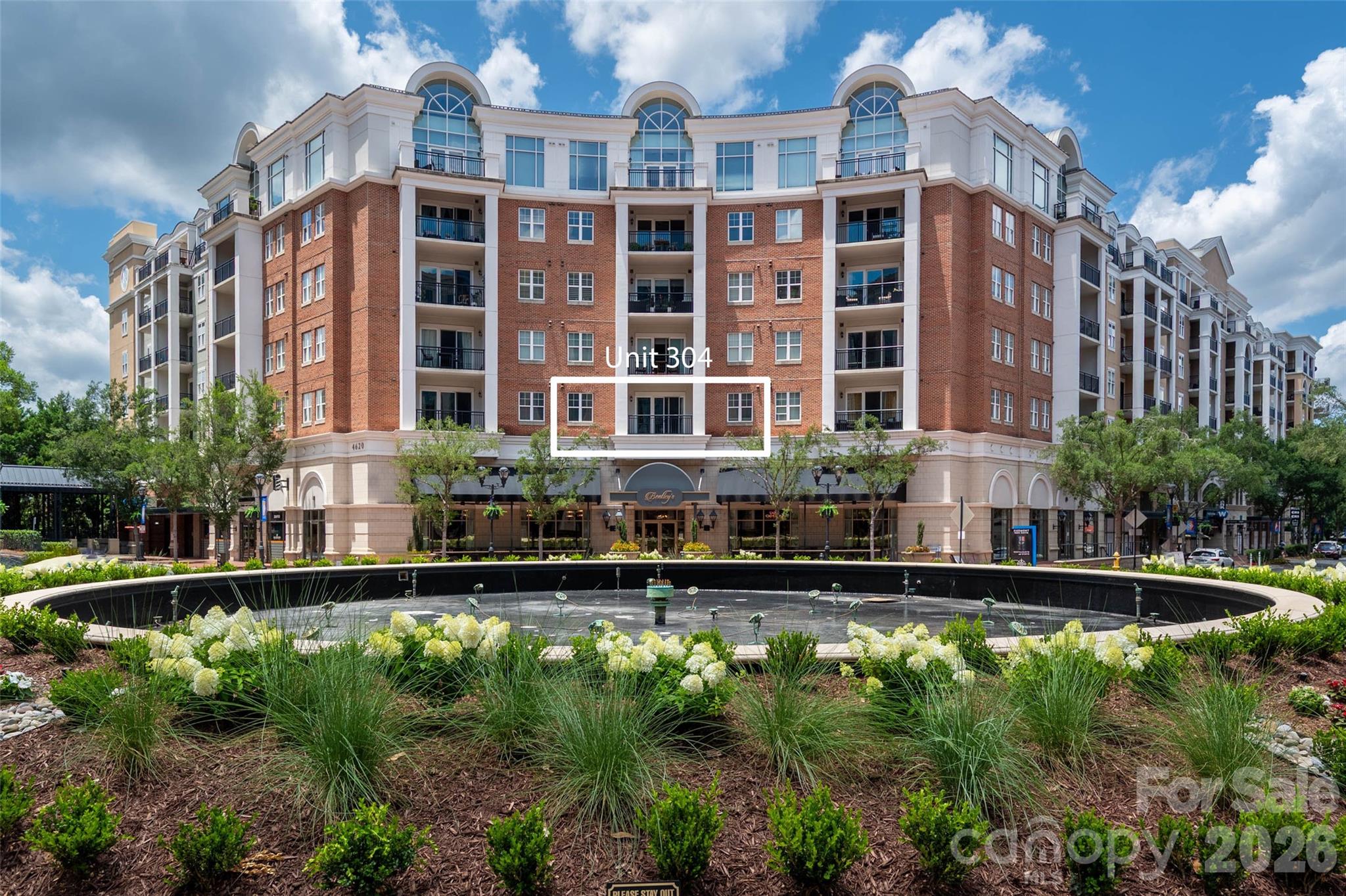Move-in ready meets lock-and-leave convenience in Southpark’s Piedmont Row! This pristine 2BR/2BA condo features an open-concept kitchen with a large island, a spacious living area, and a large balcony overlooking the peaceful fountain and town center shops. The split-bedroom layout offers ultimate privacy, with both bedrooms offering custom walk-in closets and attached full baths.

Enjoy total peace of mind with major recent updates: HVAC & Water Heater (2025), Washer/Dryer (2024), Stainless Appliances (2023), and LVP flooring (2022). Washer/dryer and refrigerator convey! Includes 2 deeded parking spaces.

Piedmont Row features top-tier amenities including a rooftop pool, grilling terrace, clubroom, rec room, and 24-hour security. Ample options for dining, coffee, beauty services, and a YMCA are right downstairs plus high-end Southpark Mall is adjacent. All this and zoned for top-rated schools! Investors welcome with no rental cap and 12-month lease minimums. Schedule your tour today!