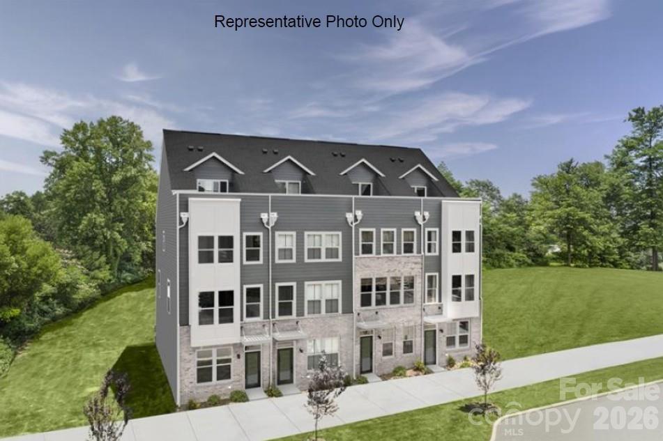 Welcome to Ashmore Square, a modern townhome community in Charlotte’s thriving Research Park District, ideally positioned near UNC Charlotte, the Vanguard Campus, and TIAA. Located less than 2 miles from I-85, this community offers quick access to Uptown Charlotte, University City, and major commuter routes. Everyday convenience and entertainment are just minutes away with Trader Joes, IKEA, Target, Topgolf, shopping centers, dining options, and nearby greenways all within close reach. Ashmore Square blends architectural style with low-maintenance living, featuring attractive brick and fiber cement exteriors, sidewalks, and a welcoming central courtyard designed for gathering or relaxing outdoors. HOA-managed lawn maintenance allows residents to enjoy community spaces without the burden of exterior upkeep. The neighborhood offers the ideal combination of connectivity, convenience, and modern appeal. This NE facing Rooftop Terrace Floorplan at Ashmore Square offers private views and fresh air! This Clarendon floorplan delivers a four-story layout designed to support a variety of lifestyles. The lower level includes a private bedroom next to a full bath, ideal for guests, a home office, or additional living space. The main level features an open-concept kitchen with a spacious island (with the option of soft close cabinets) and a breakfast bar that flows seamlessly into the dining area and great room, creating an inviting environment for entertaining or everyday living. Upstairs, the owner's suite includes a walk-in closet and ensuite bath with the option for a frameless shower door, complemented by an additional bedroom with an ensuite bath and conveniently located laundry. The top floor includes a guest bedroom with an ensuite bathroom and access to the rooftop terrace for great views. Blinds are even included! Experience modern townhome living in one of Charlotte's most connected locations!