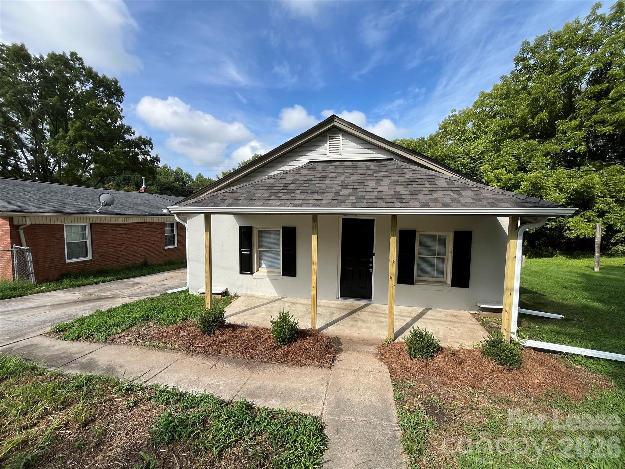 This cozy 3 bedroom 1 bath residence, offering 1,146 sq ft of comfortable living space, has been thoughtfully updated to provide modern conveniences while maintaining its inviting charm!
You will fall in love with the open covered front porch...an inviting outdoor space perfect for relaxation or to start your day with a morning cup of coffee!
Beautiful luxury vinyl plank flooring and a lovely fireplace welcome you into the spacious living room! The eat-in kitchen features a four-piece black appliance package, making cooking and dining a pleasure! You will find the flexible dining room to be a versatile space that can easily be transformed into a home office or additional living area to fit your needs!
The comfortable primary bedroom is complete with a ceiling fan to keep you cool and comfortable. You will enjoy the comfort of plush carpeting in each bedroom, as well as stylish luxury vinyl plank flooring in the common areas. All bedrooms share an updated bath, with sleek fixtures, offering a fresh modern look!
For your convenience, the home is equipped with washer/dryer connections. A nice-sized back yard and driveway round out the home.
**Please note: Some photos have been enhanced to help envision yourself in this home.