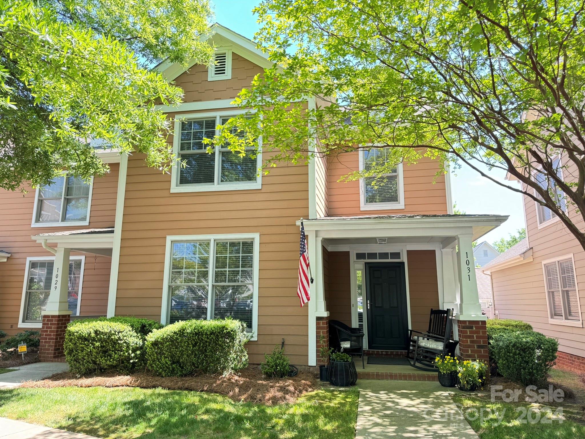 A rare find in Baxter Village...Market Street end unit townhome with primary on the main!!!  This updated townhome features primary on the main with a newly renovated shower and bath, a great open floor plan with a kitchen that flows into the living room with a beautiful gas fireplace and plenty of space in the dining room to entertain.  The second-floor features 2 bedrooms with a full bath that was also recently renovated, a loft/office, and walk-in attic storage.  The backyard features a small deck for grilling and a 2-car garage that opens onto the rear alley.  This wonderful townhome is just across the street from Baxter Village Town Center, home to restaurants, shopping, salons, a barber shop, various businesses and festivals of all types.  With just a few steps to the , library, elementary school, walking trails, and parks, this is the perfect location for anyone to call home!