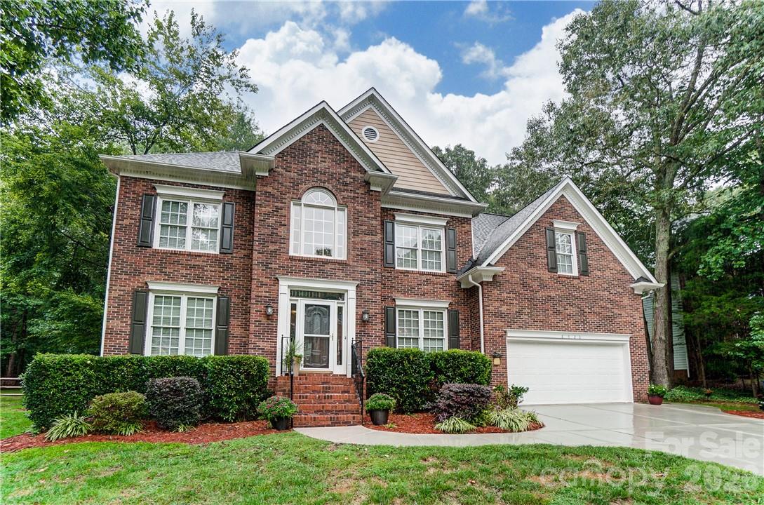 Meticulously updated home in park like setting. Primary Suite on main level with spacious bath and WIC. Gorgeous 2 story at entrance and great room. Beautiful windows to look out over your private and serene back yard. Home has been kept in updated condition: Bathrooms include granite countertops and tasteful tile, engineered hardwoods, plush carpeting, custom kitchen cabinets, stainless double oven, new HVAC system in 2014 & 2015, 30 yr. Roof replaced in 2012.  The home comes with an encapsulated crawl space... Taxes list it as a 5 bedroom but it is used as a 4 bedroom with a huge 20 x 17' bonus room. Second staircase off kitchen to bonus room with extra large storage room upstairs. An Irrigation system has been added to keep your beautiful grass green. New Trex decking with a fenced in back yard for entertaining in private park like setting. Peaceful southern breezes to accompany your sweet tea. 2 car Garage has ample storage.  Neighborhood with tree lined entrance and spacious club house, play ground, tennis, volley ball and basket ball courts. Schools w/in walking distance and 5 minutes to Birkdale Village. Life as it should be!  Welcome to Wynfield Forest, your home sweet home.