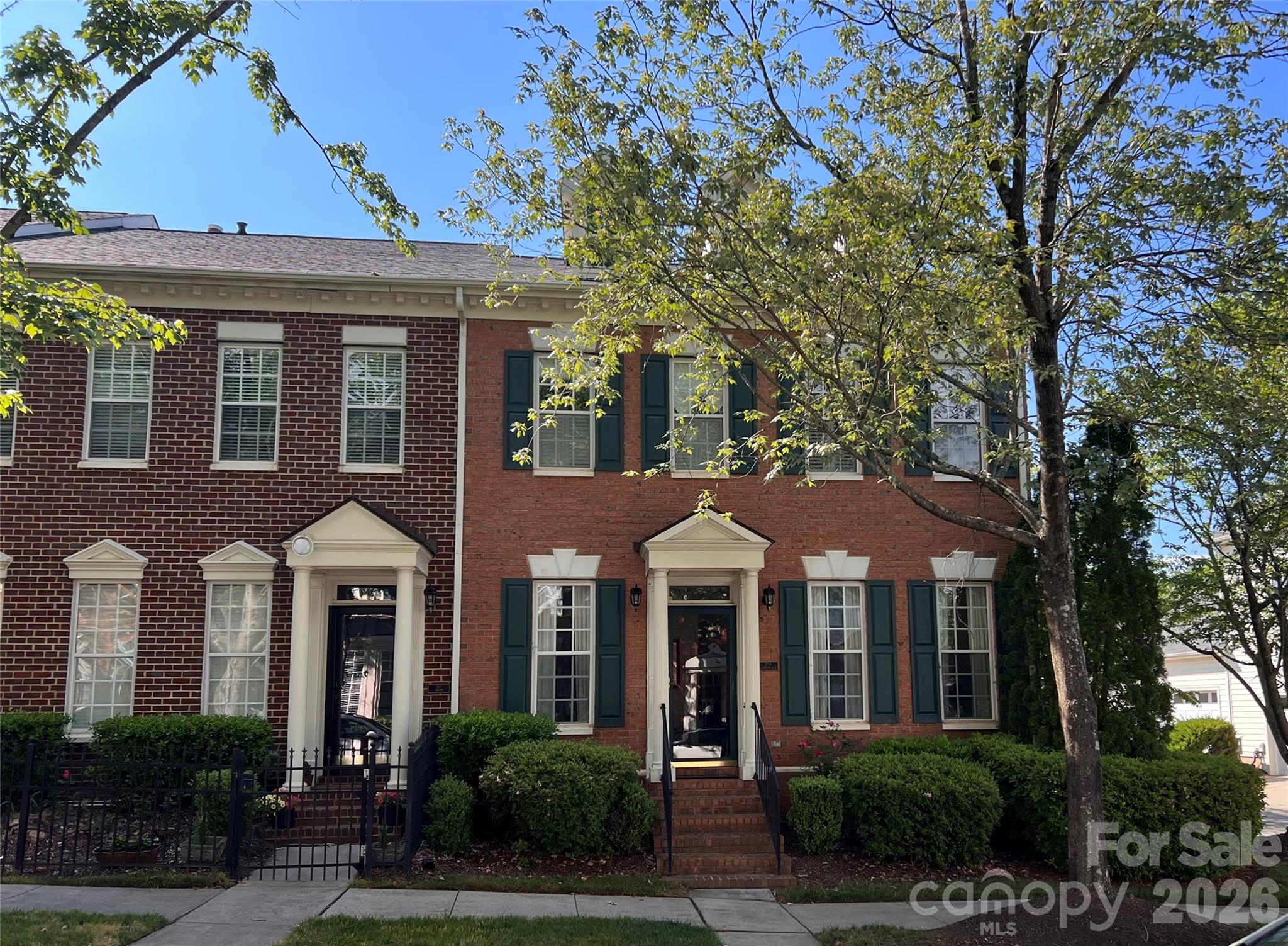 Highly desirable end unit townhome with primary bedroom on main level. Twain Avenue is a beautiful tree-lined street  in  the St. Albans neighborhood. One-owner home with main level living/dining room, separate office and eat-in kitchen. Spacious enclosed brick patio along a side yard with mature trees. Gate from patio allows for easy access to this walkable community.  Large walk-in attic storage area on the upper level. Two car rear garage measuring 537 square feet. St. Albans is walkable to downtown Davidson.  Vibrant neighborhood with activities, parks and walking paths as well as dog park.