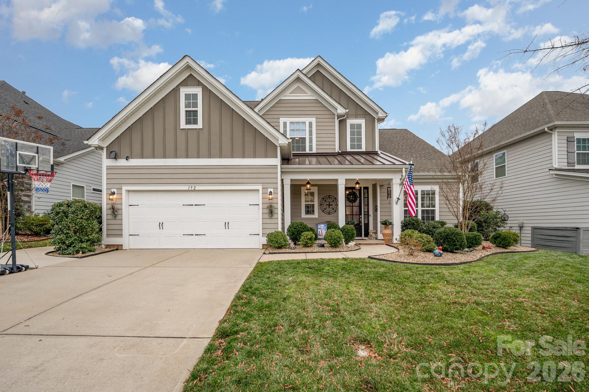 Welcome to 192 Hampton Trail Drive in Fort Mill — a move-in ready luxury home offering the perfect blend of elegance, thoughtful upgrades, and resort-style community living in one of the area’s most desirable neighborhoods.

Designed for today’s lifestyle, this beautifully appointed home features a bright, open floor plan with soaring ceilings, abundant natural light, and upscale finishes throughout. The seamless layout is ideal for both everyday living and effortless entertaining.

The gourmet kitchen is the heart of the home, complete with stainless steel appliances, quartz countertops, custom cabinetry, and an oversized island perfect for gathering. It flows effortlessly into the spacious living and dining areas, creating a warm and connected feel.

A major highlight is the primary bedroom on the main level, offering convenience and privacy. This luxurious retreat features a spa-like bath with dual vanities, a soaking tub, separate shower, and generous walk-in closets. Upstairs, additional bedrooms and flexible space provide room for a home office, bonus room, or media space.

A standout addition is the Four Seasons room, added last year, providing living space to enjoy year-round. Whether used as a sitting room or entertaining area, it offers versatility and comfort in every season.

This home is enhanced with permanent exterior trim lighting, fully customizable and easily controlled through an app — perfect for holidays, game days, or everyday curb appeal. An irrigation system keeps the lawn lush and beautifully maintained with ease. Smart home features and energy-efficient systems add convenience and functionality.

Step outside to enjoy your private backyard or take advantage of exceptional HOA amenities, including a community pool, clubhouse, playground, and a scenic lake with walking trails — offering a true lifestyle experience just steps from your door.

Located near Fort Mill schools, shopping, dining, parks, and convenient commuter routes to Charlotte, this home delivers luxury, location, and lifestyle all in one.

If you’ve been searching for open concept living, a primary suite on the main level, modern upgrades, and resort-style amenities in Fort Mill, 192 Hampton Trail Drive is the one.