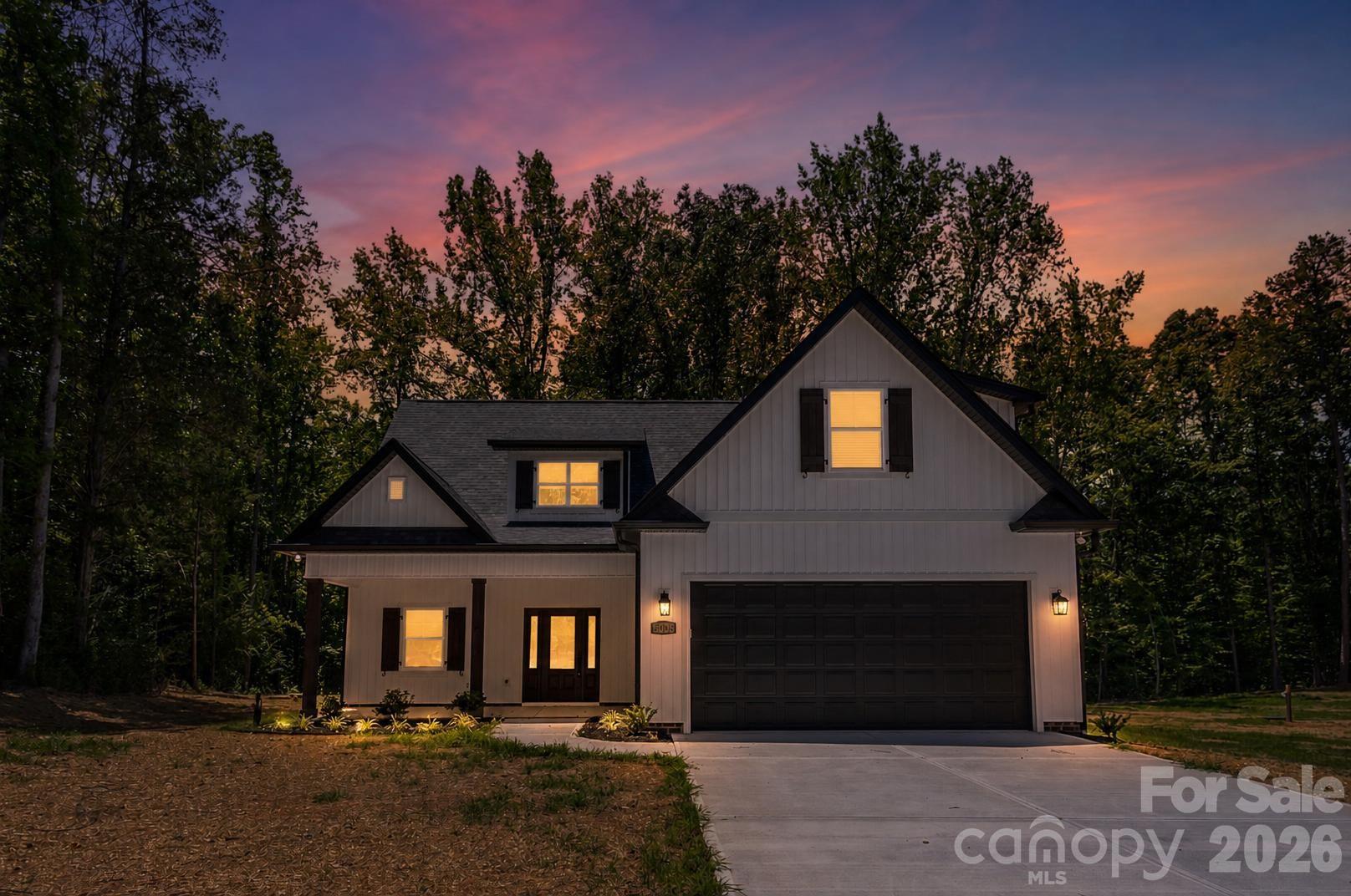 The stunning newest release from the sold out Oconee Collection! This new build is being sold below appraisal and displays the craftsmanship you desire at a price point you can't believe. As expected with this collection, not a corner was cut or penny pinched in constructing this masterpiece. Modern farmhouse charm mixes with mid-luxe design! With over 2,000 sqft this home offer plenty of space to spread out with a full 2-story floor-plan. Home features LP siding, screened in sunroom, upgraded appliances, custom cabinets, and so very much more. No restrictions, no HOA, and no city taxes! Primary on main and a large bonus room upstairs. These homes always sell out fast when released! Schedule your showing today!