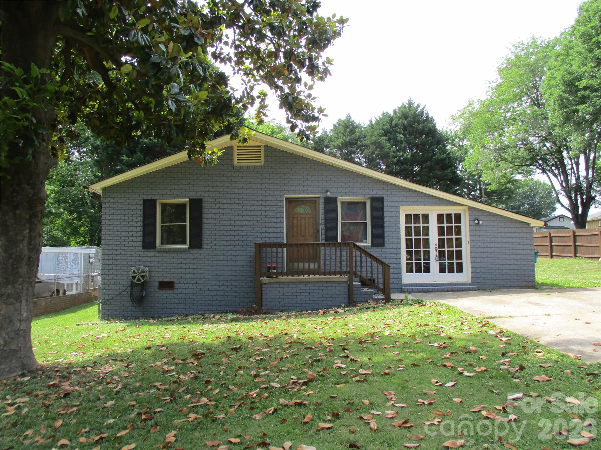 Great opportunity to own this charming 3 bed 2 bath full brick home, minutes away from popular downtown Belmont. The garage was transformed into extra living space. Storage building in the back yard. Fenced back yard.