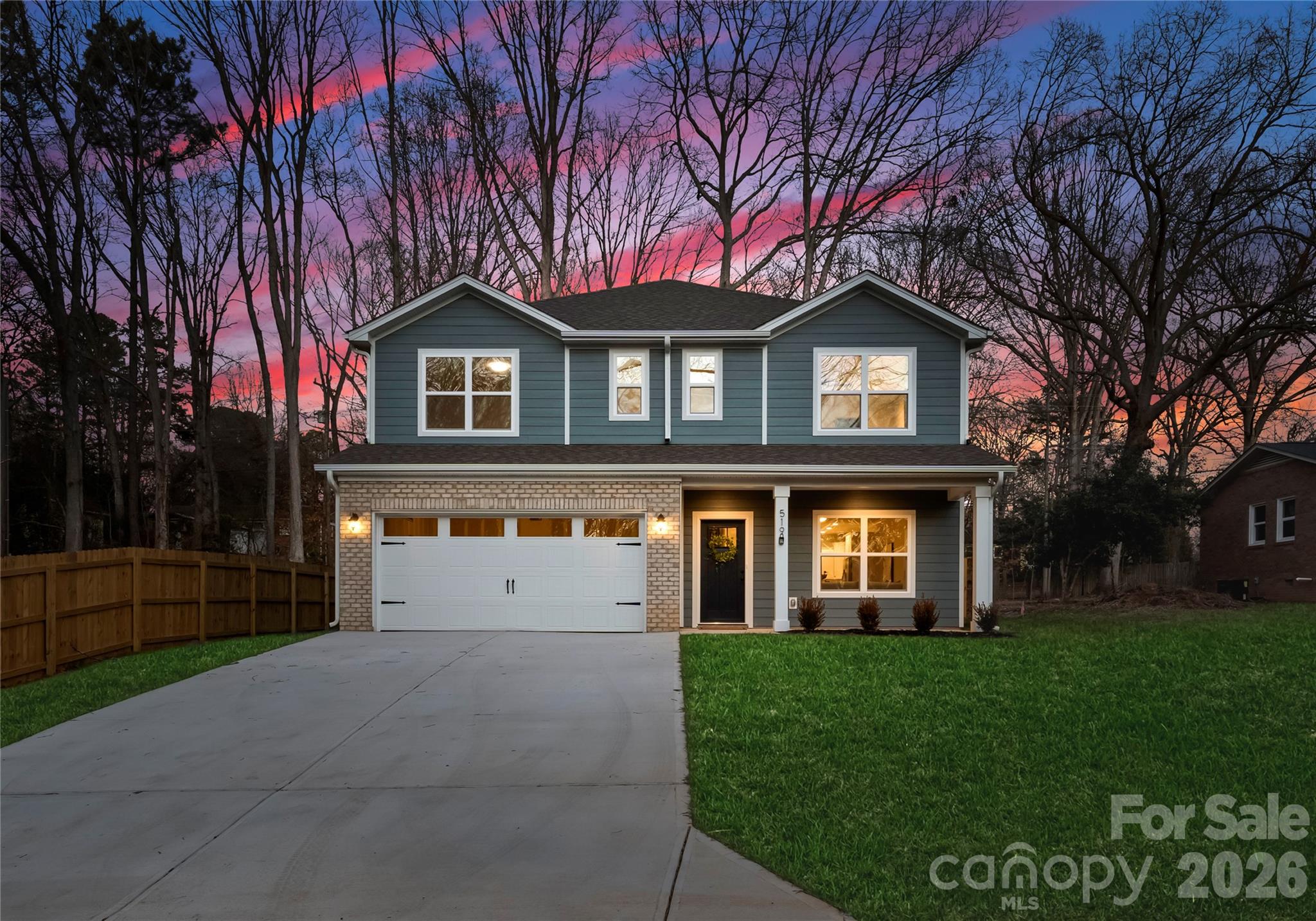 Tucked away on a quiet dead-end street in an established Charlotte area, this new construction home sits on a spacious half-acre lot and offers a rare blend of privacy, modern design, and everyday functionality. The open-concept main level is centered around a stylish kitchen with soft-close cabinetry, a large island, and seamless flow into the dining and living spaces—ideal for both entertaining and daily living. A main-level guest suite adds flexibility, while upstairs the spacious primary suite and additional bedrooms provide room for family, guests, or a home office. Enjoy peaceful outdoor views with your own private pond setting, creating a unique retreat while still being convenient to shopping, dining, parks, and major commuter routes. Photos are representative of a completed home, and final finishes, features, and layout details may vary.