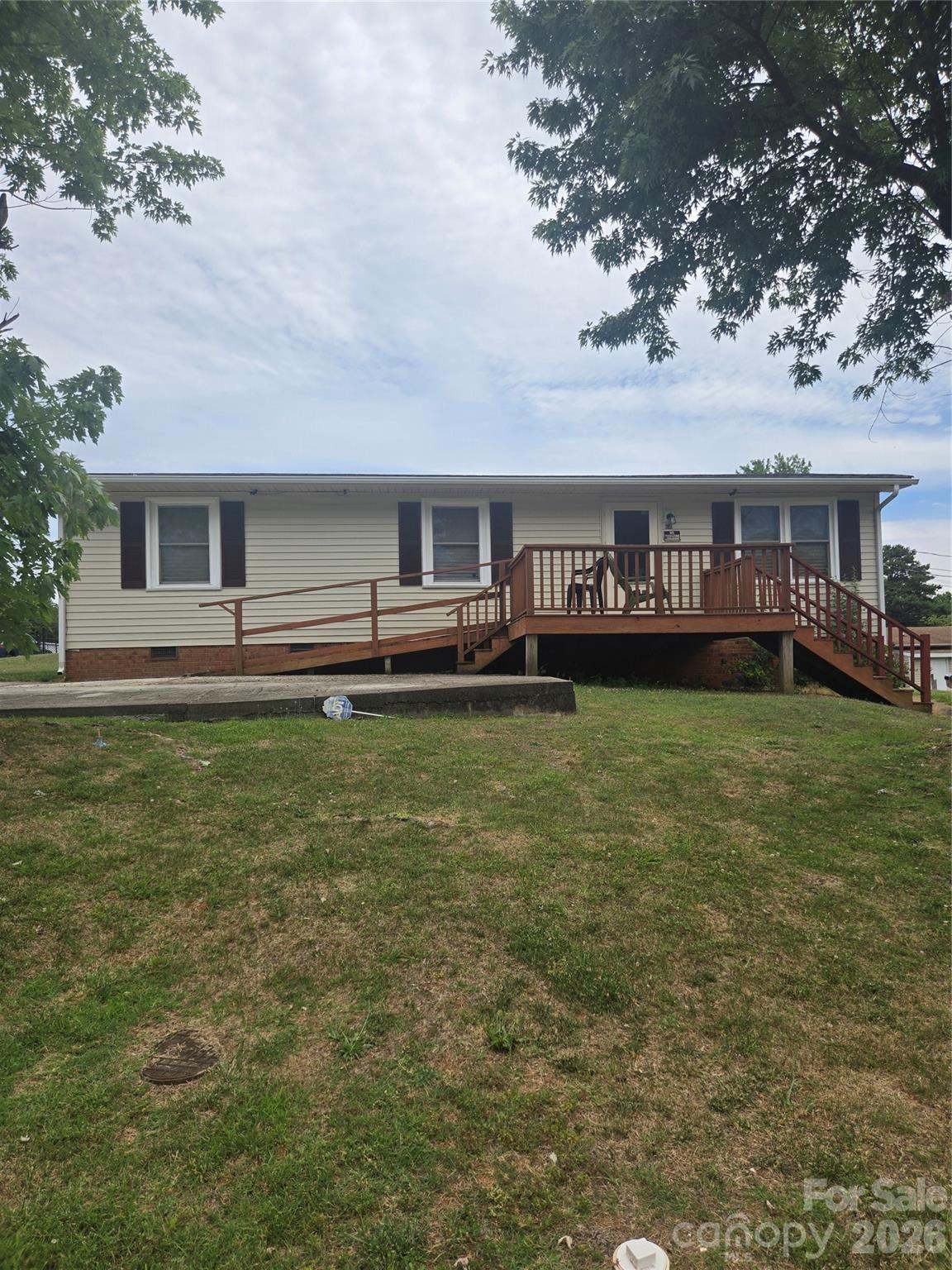 This home is located in an established neighborhood on a corner lot, privacy fence in back with space to grow.
