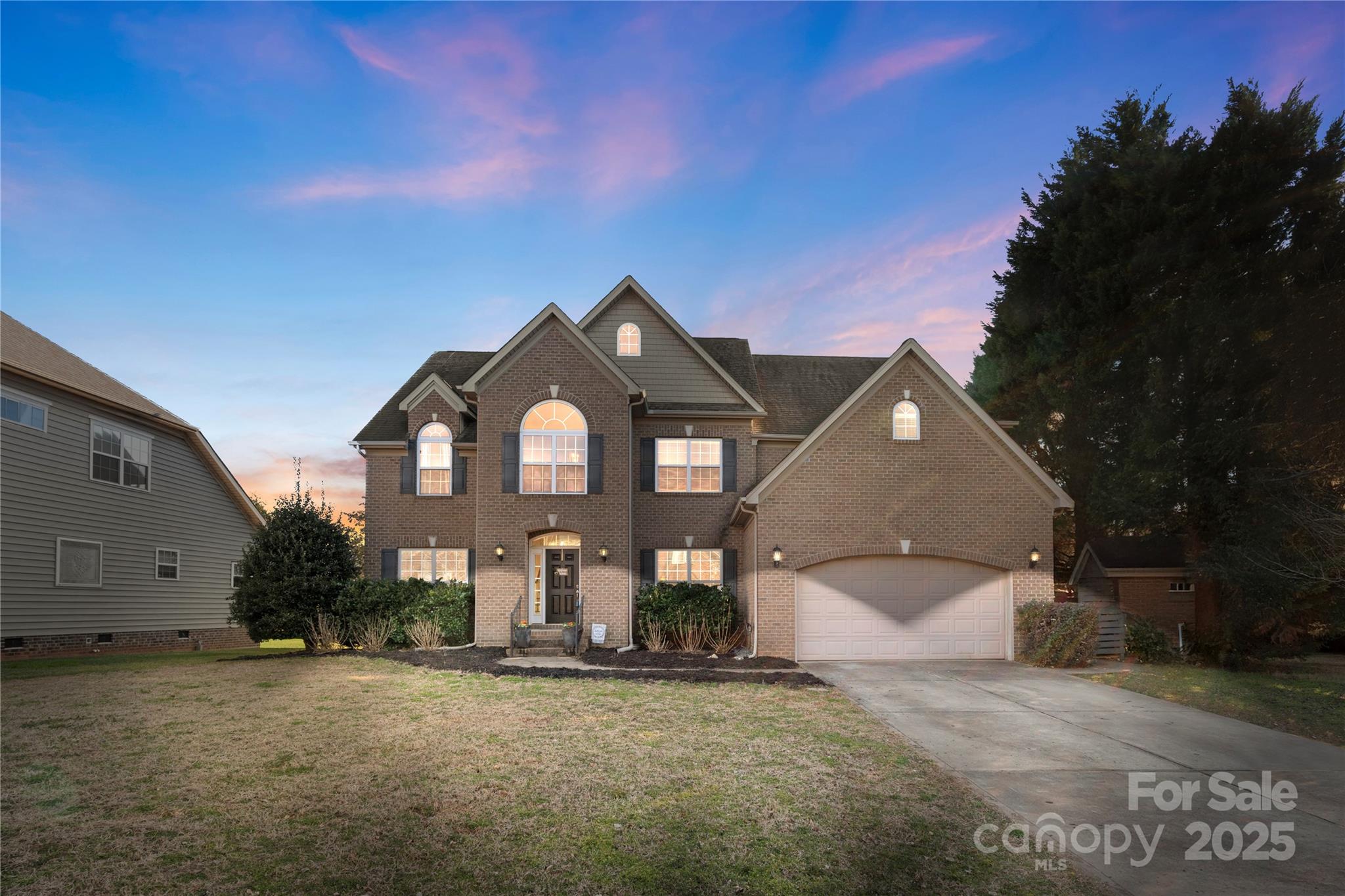 Stunning 4BR/2.5BA traditional home with open floor plan and natural light throughout. The main level features beautiful flooring, fresh neutral paint, a brick-mantle fireplace, dedicated office/flex space, formal dining with tray ceiling, and a kitchen with granite countertops, tiered island, pantry, and custom tile backsplash. Upstairs, the spacious primary suite offers a tray ceiling, walk-in closet, soaker tub, enclosed shower, and dual vanity—plus three additional bedrooms and a versatile bonus room. This home is attractively priced to reflect a few areas where the next owner may want to update, offering built-in value and the opportunity to create instant equity. Enjoy a rear deck with pergola, invisible dog fence, irrigation system, and access to neighborhood amenities. Notable extras include surround sound, a 10-yr termite treatment (2023), and a new 2nd-floor HVAC with UV screen and transferable warranty (2023). Located just across the SC border with quick access to Charlotte!