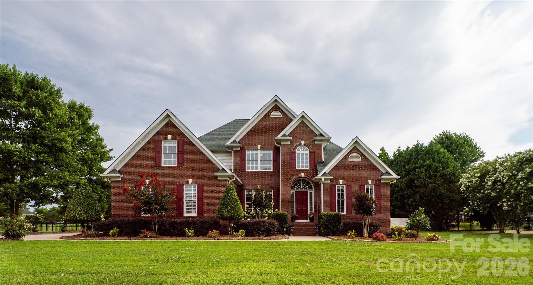 Welcome to this beautifully maintained full brick home nestled on a picturesque 1-acre lot in the desirable Homewood community of Rock Hill. Offering 4 bedrooms, 2.5 bathrooms, and over 2,800 square feet, this thoughtfully designed floor plan combines timeless style with everyday functionality.
The spacious main-level primary suite provides a private retreat, while the dramatic two-story foyer and soaring vaulted great room create an impressive first impression. The bright, open living spaces are perfect for both entertaining and everyday living, featuring a cozy fireplace and abundant natural light.
The kitchen offers ample workspace and storage and flows seamlessly into the breakfast area and living spaces. Upstairs, you'll find three additional bedrooms, including a versatile fourth bedroom that can easily serve as a bonus room, home office, media room, or playroom.
Enjoy peaceful mornings and relaxing evenings on the rear deck overlooking the expansive and extensively landscaped backyard, offering plenty of room to garden, play, or simply enjoy the privacy of country-style living while remaining just minutes from shopping, dining, schools, and I-77. 
All furniture is negotiable.
