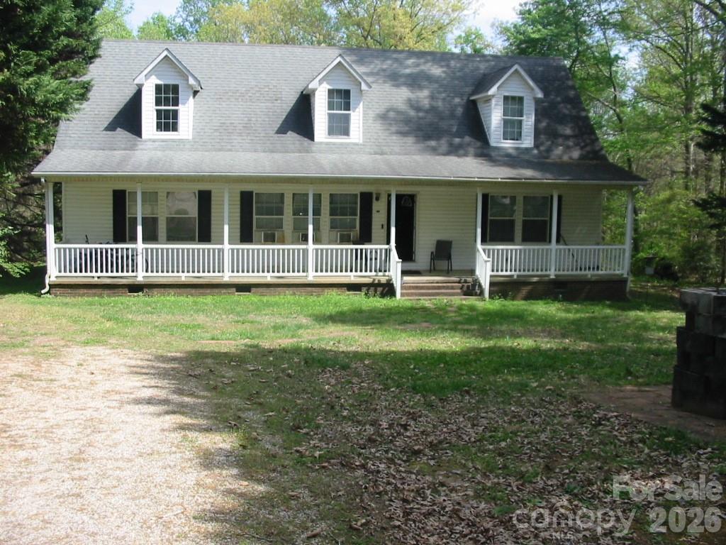 PROGRAMED FOR PLEASURE. Spacious 3 bedrooms, 2 full baths, split bedroom plan. Plenty space at the top. Extra large room on second level can be used as office, child play, or 3rd spacious bedroom. Large unfinished attic can be converted into multiple usages. Covered front porch, two small decks on back. Spacious back yard is great for grilling, barbeque, friends and family gatherings. Large .52 acre lot.  "TO BE SOLD AS IS".