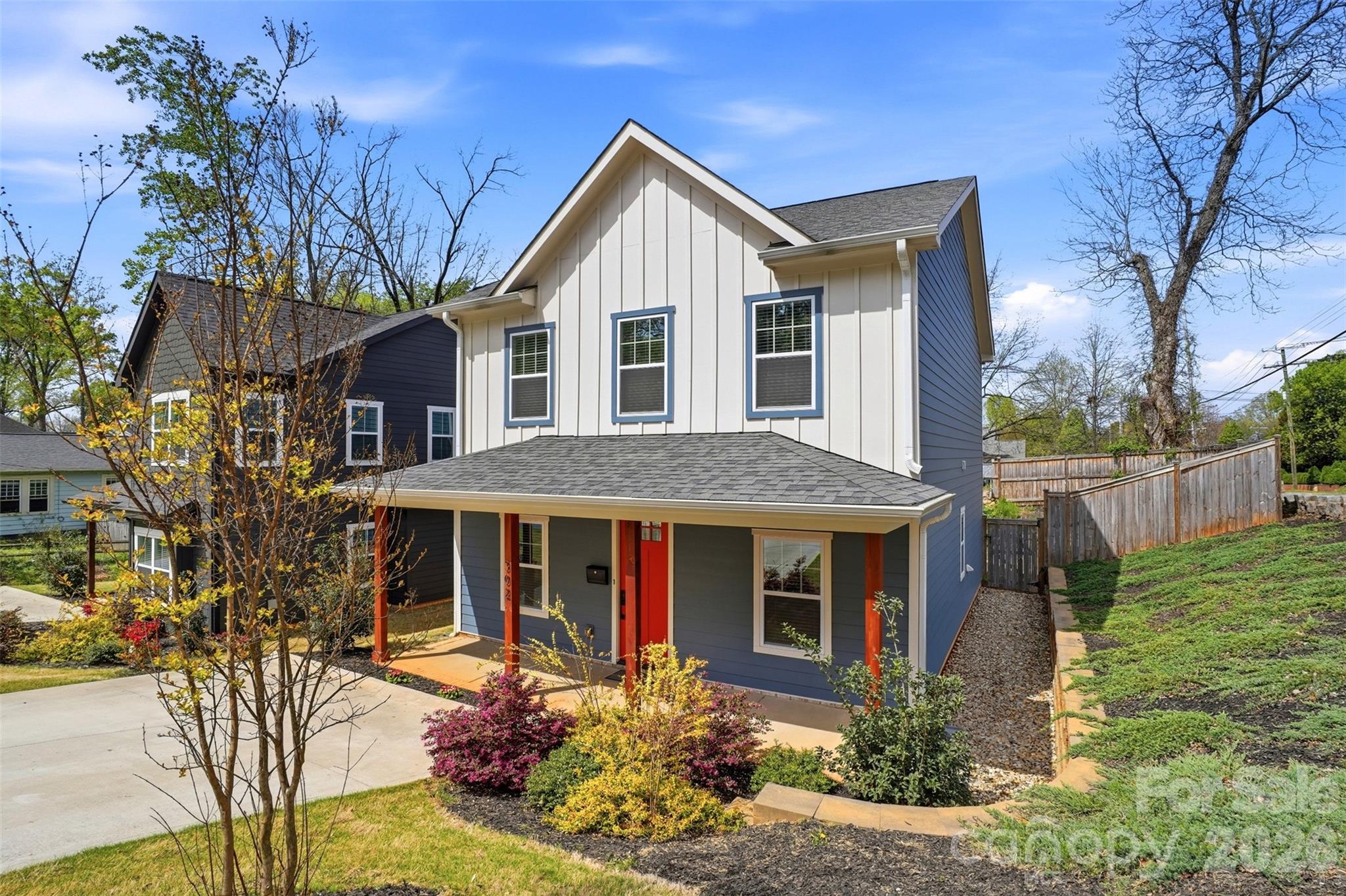 Modern home just minutes from Uptown Charlotte with NO HOA! Three minutes to downtown and 12 minutes to CLT Airport, this home offers the perfect blend of style, functionality, and convenience, plus remaining builder’s structural warranty for added peace of mind. Step inside to find 9' ceilings, LVP flooring, neutral paint, modern light fixtures, ceiling fans, and abundant natural light throughout. The cozy gas fireplace anchors the main living area, while a versatile downstairs flex space provides the perfect spot for a home office or playroom. A drop zone with separate entry by the downstairs laundry room with folding table adds to everyday convenience. The kitchen is designed for both everyday living and entertaining, featuring quartz countertops, tile backsplash, stainless steel appliances, gas cooktop, double oven, and a large island with cooktop and room for seating. Window treatments are included throughout the home. Upstairs, the primary suite offers a spacious walk-in closet and an updated bath with a custom sliding door and a large walk-in shower with frameless glass. Enjoy outdoor living on the stamped patio overlooking a fully fenced backyard—perfect for relaxing or hosting. A covered front porch adds even more charm and curb appeal. Lovingly maintained by a single occupant, this home has been exceptionally well cared for and is truly move-in ready.