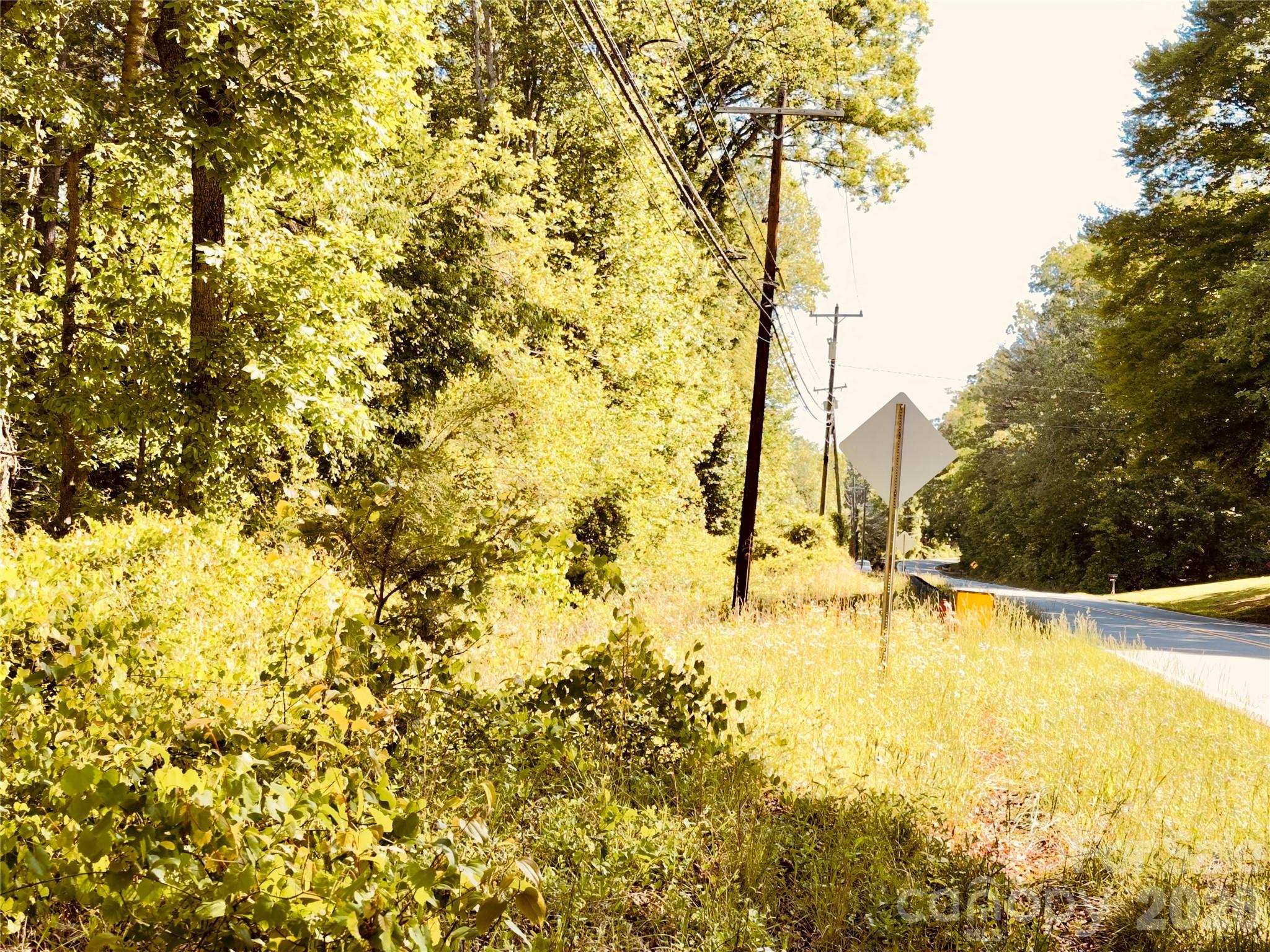 Two adjoining lots, 13B and 15, totaling approximately 4.27 acres. The property lies below the roadway, with a DOT guardrail spanning most of the Hwy 70E frontage. Buyer is responsible for verifying any NCDOT requirements regarding access and obtaining a driveway permit from Hwy 70E. Conveniently located near Lake James and the Fonta Flora State Trail, and just minutes from downtown Marion. Property is priced and being sold as is.