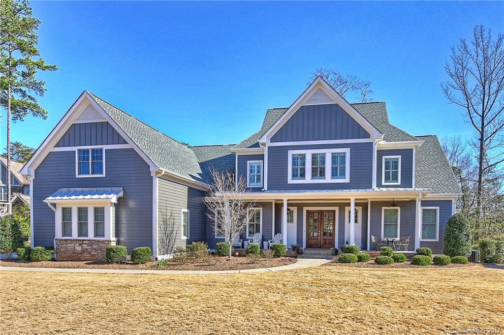 Stunning custom home by E.S. Johnson Builders, located on most sought after street in Springfield!  Ideally sits on quiet cul-de-sac street surrounded by open space & golf course.  Quality craftsmanship & details found throughout including hardwoods on main level, gorgeous coffered ceiling in great room w/stone fireplace.  Open kitchen features Thermador 6-burner gas  range, large island for great place to gather w family, relax on screen porch & just enjoy the quiet evenings!  Must See Quality!