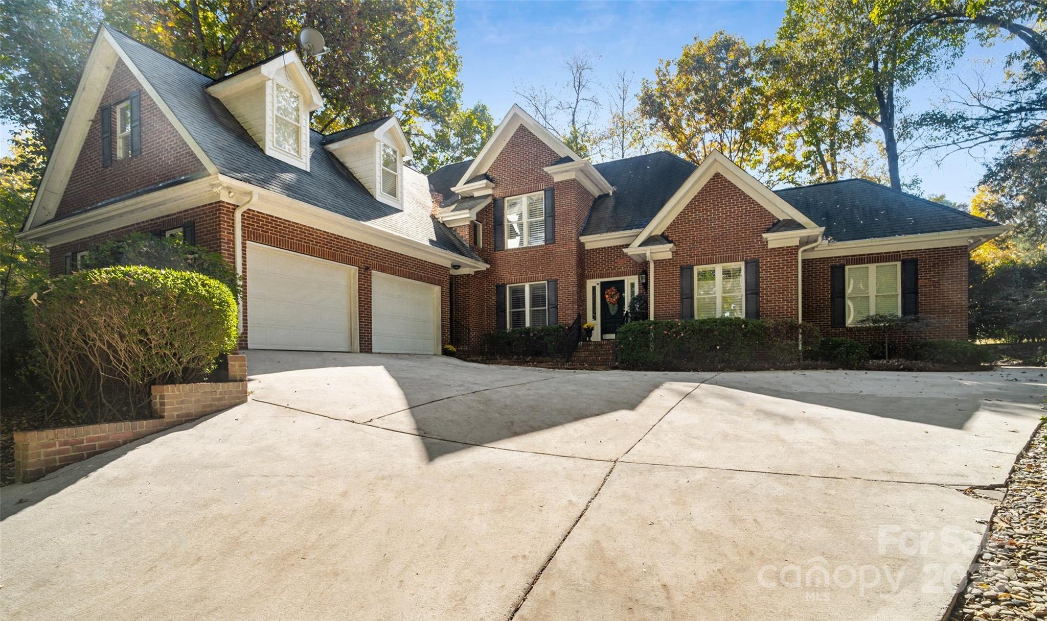 Back on the market at no fault of the seller! WHOLE HOUSE GENERAC GENERATOR added in 2024! Seller loves the home it’s just life changes. Welcome to this beautifully maintained home in the gated River Hills community, located on a quiet cul-de-sac. Nestled on a private 0.43-acre lot with mature trees, this 3-bedroom, 2.5-bath home with a bonus/flex room offers everything you need. The sought-after main-level primary suite provides luxury and convenience. Built in 2007, the home features hardwood floors, a dedicated office, formal dining and living room, a bright eat-in chef’s kitchen, and family room. Upstairs are two bedrooms, a full bathroom, and a large bonus room ideal for a playroom, or media space. The backyard boasts a covered patio and generous outdoor space perfect for entertaining. Additional highlights include plantation shutters, a two-car garage, ample air-conditioned storage. Community amenities include walking trails, 24-hour security, marina, beach, and optional country club membership. Located in award-winning Clover Schools.
